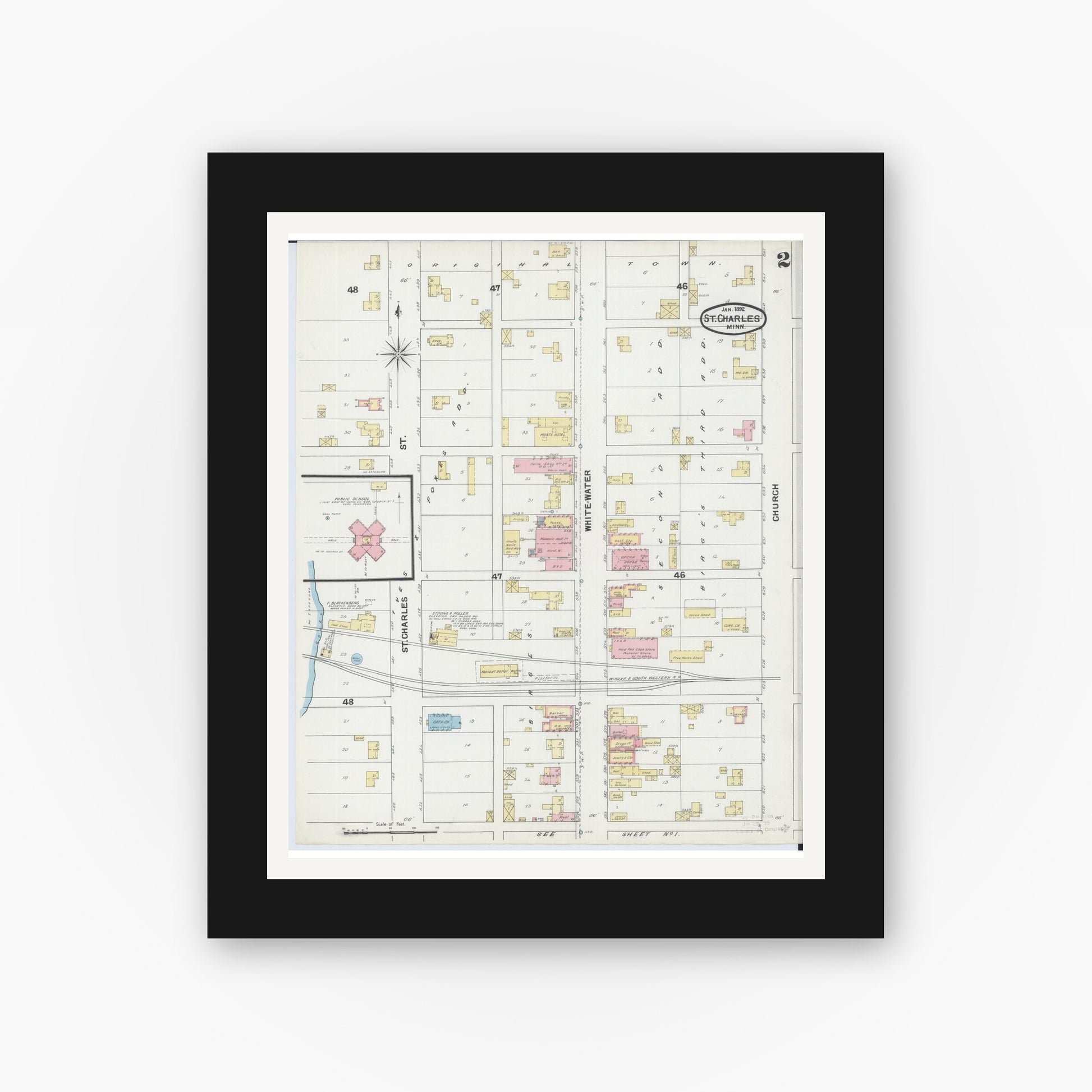 Old map wall art mockup — black gallery frame with white mat — Sanborn Fire Insurance Map from Saint Charles, Winona County, Minnesota (1892), Sheet #0002