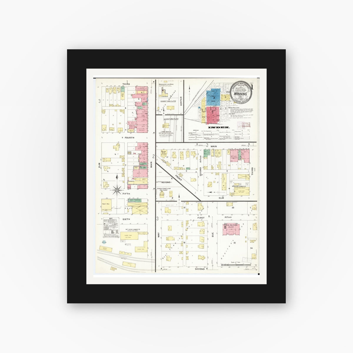 Old map wall art mockup — black gallery frame with white mat — Sanborn Fire Insurance Map from Manning, Carroll County, Iowa (1908) â€” Complete Set