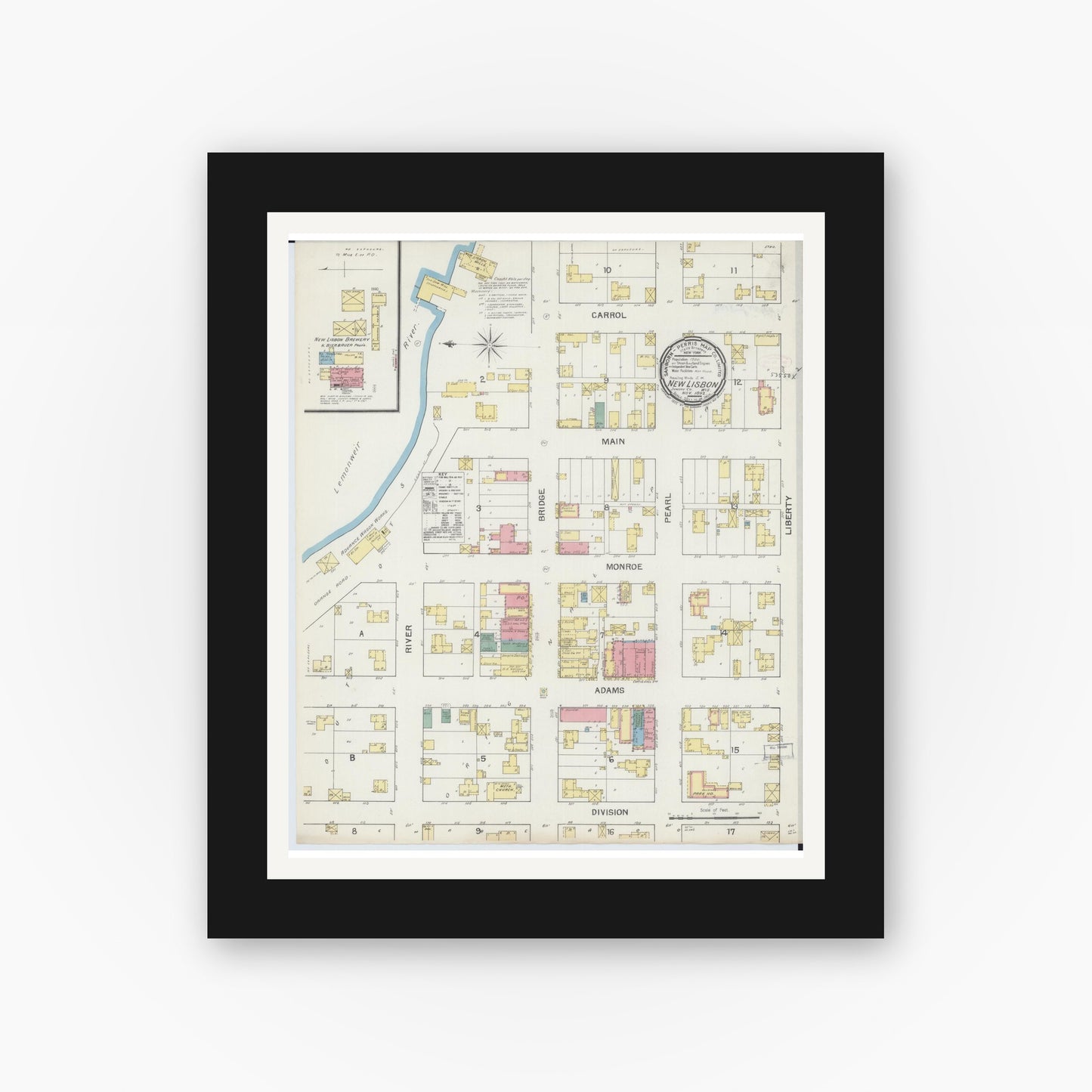 Old map wall art mockup — black gallery frame with white mat — Sanborn Fire Insurance Map from New Lisbon, Juneau County, Wisconsin (1892), Sheet #0001