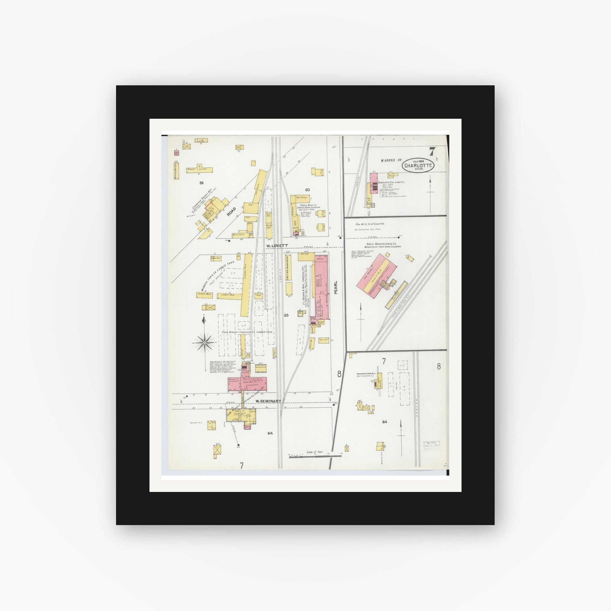 Old map wall art mockup — black gallery frame with white mat — Sanborn Fire Insurance Map from Charlotte, Eaton County, Michigan (1904), Sheet #0007