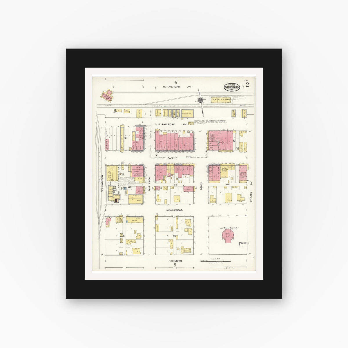 Old map wall art mockup — black gallery frame with white mat — Sanborn Fire Insurance Map from Giddings, Lee County, Texas (1921), Sheet #0002