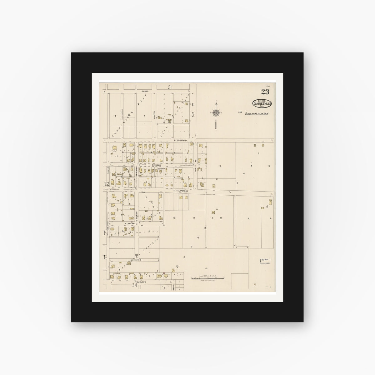 Old map wall art mockup — black gallery frame with white mat — Sanborn Fire Insurance Map from Gainesville, Cooke County, Texas (1922), Sheet #0023