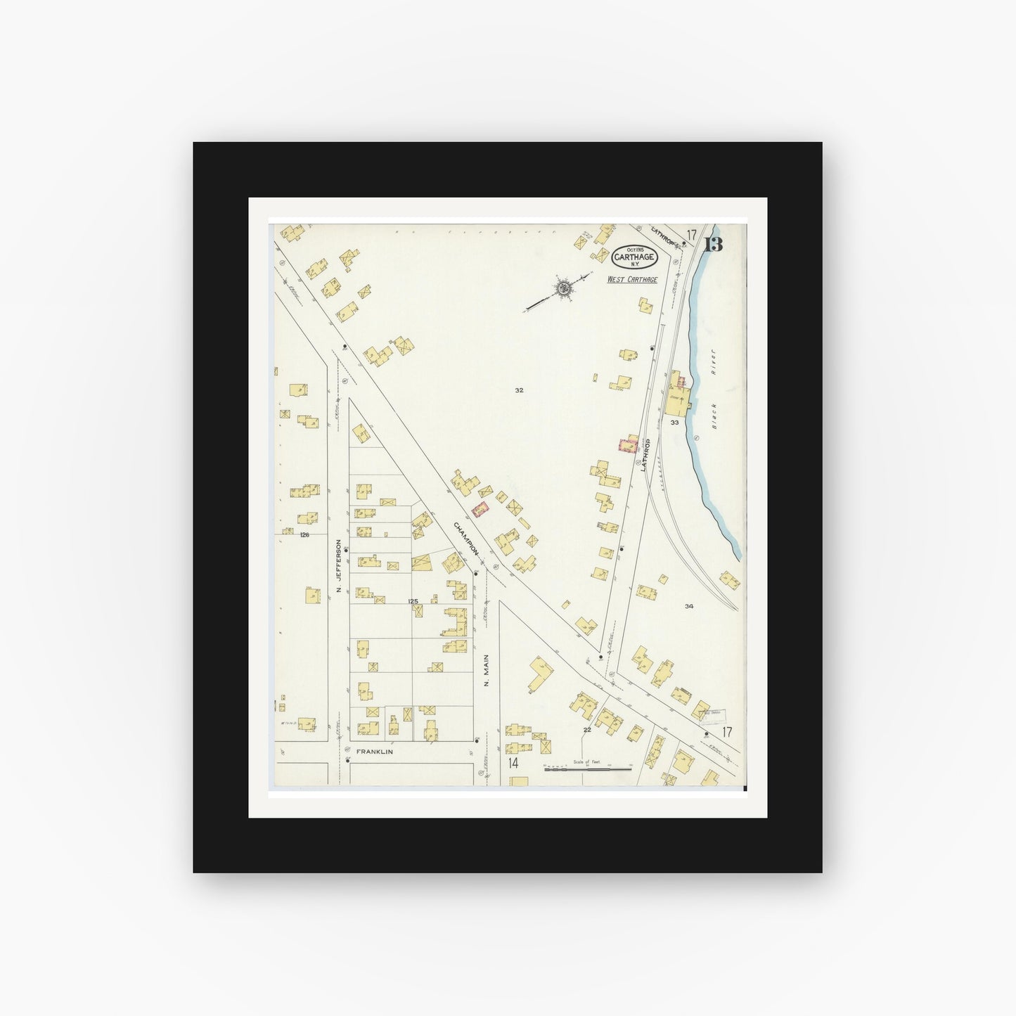 Old map wall art mockup — black gallery frame with white mat — Sanborn Fire Insurance Map from Carthage, Jefferson County, New York (1915), Sheet #0013