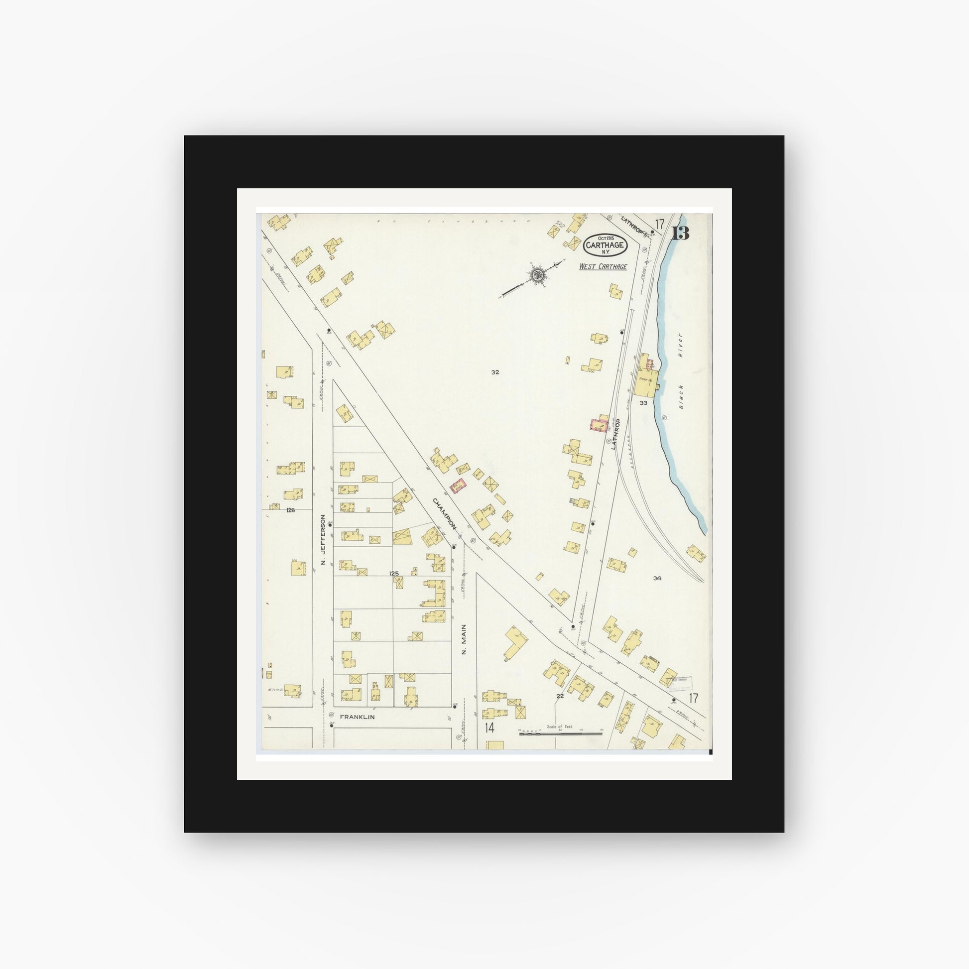 Old map wall art mockup — black gallery frame with white mat — Sanborn Fire Insurance Map from Carthage, Jefferson County, New York (1915), Sheet #0013