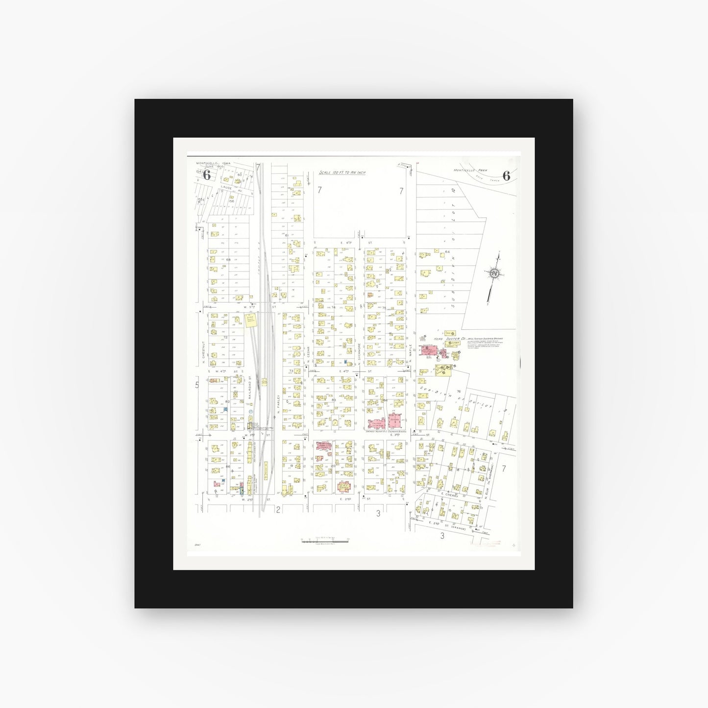 Old map wall art mockup — black gallery frame with white mat — Sanborn Fire Insurance Map from Monticello, Jones County, Iowa (1935), Sheet #0006