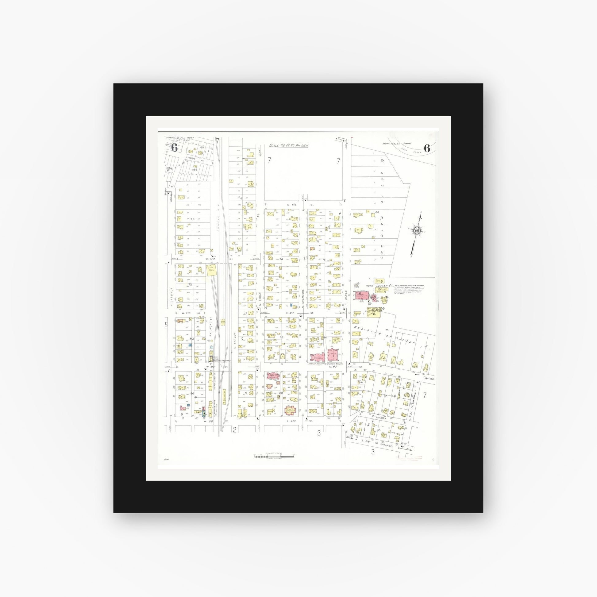 Old map wall art mockup — black gallery frame with white mat — Sanborn Fire Insurance Map from Monticello, Jones County, Iowa (1935), Sheet #0006