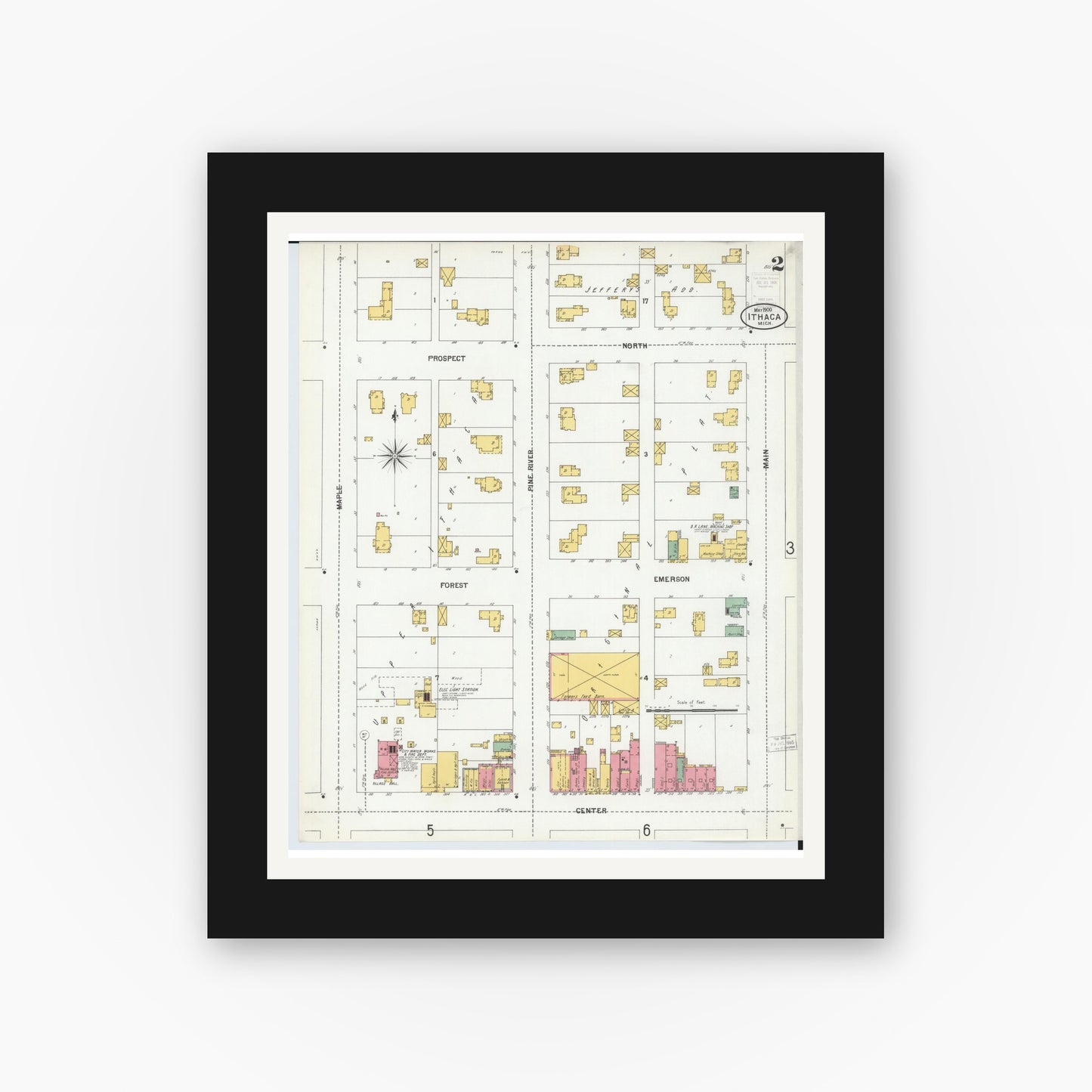 Old map wall art mockup — black gallery frame with white mat — Sanborn Fire Insurance Map from Ithaca, Gratiot County, Michigan (1900), Sheet #0002