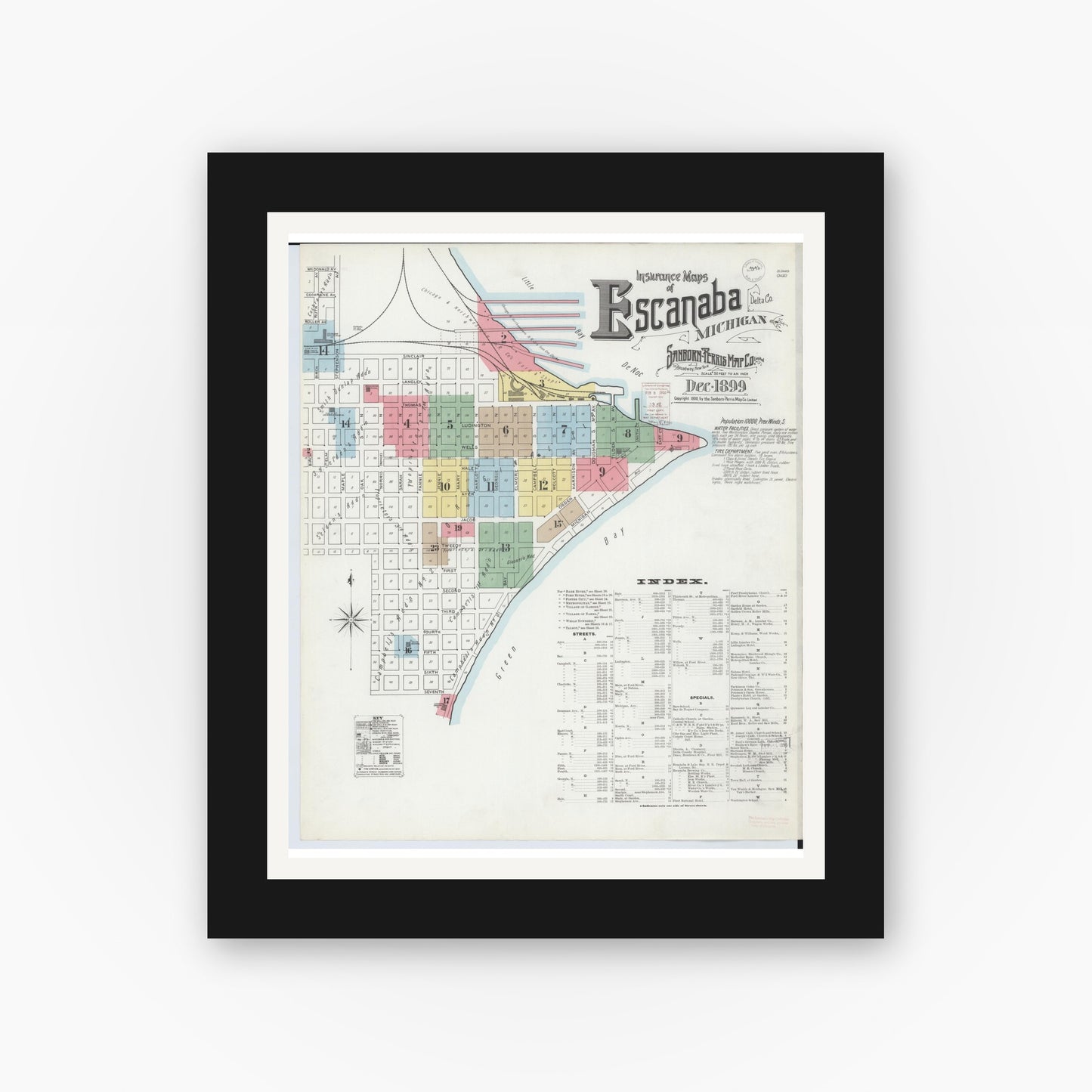 Old map wall art mockup — black gallery frame with white mat — Sanborn Fire Insurance Map from Escanaba, Delta County, Michigan (1899), Sheet #0001