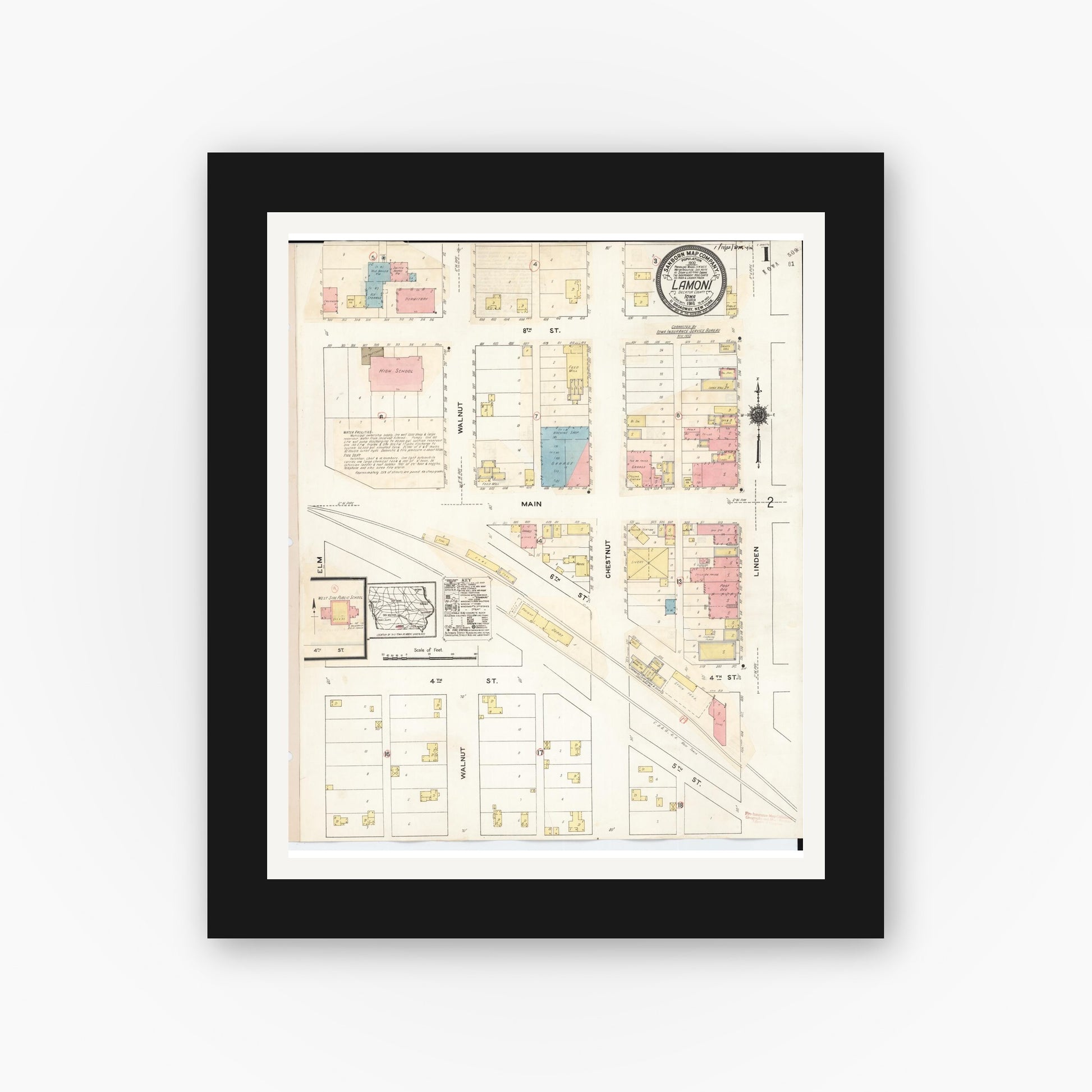 Old map wall art mockup — black gallery frame with white mat — Sanborn Fire Insurance Map from Lamoni, Decatur County, Iowa (1932), Sheet #0001