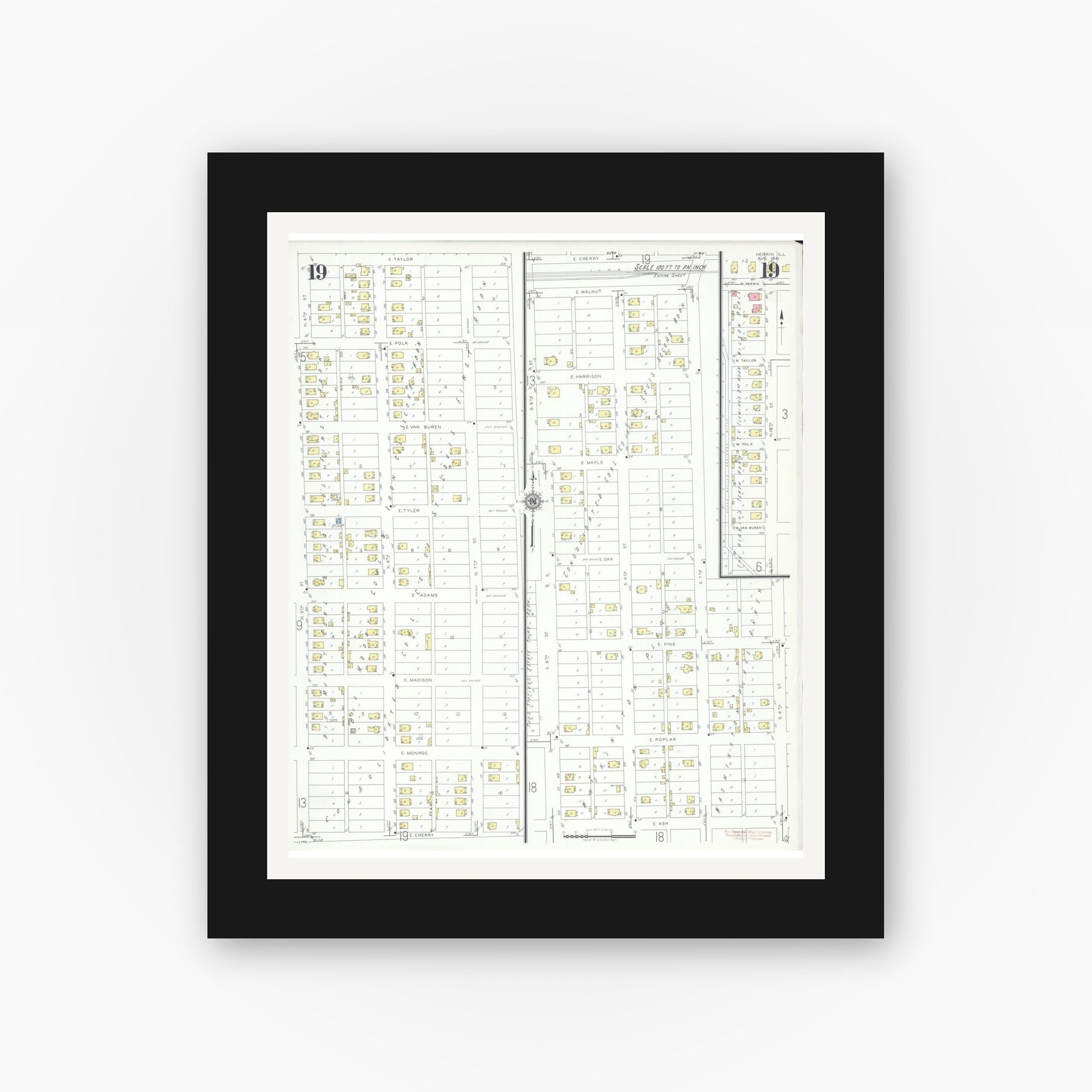 Old map wall art mockup — black gallery frame with white mat — Sanborn Fire Insurance Map from Herrin, Williamson County, Illinois (1941), Sheet #0019