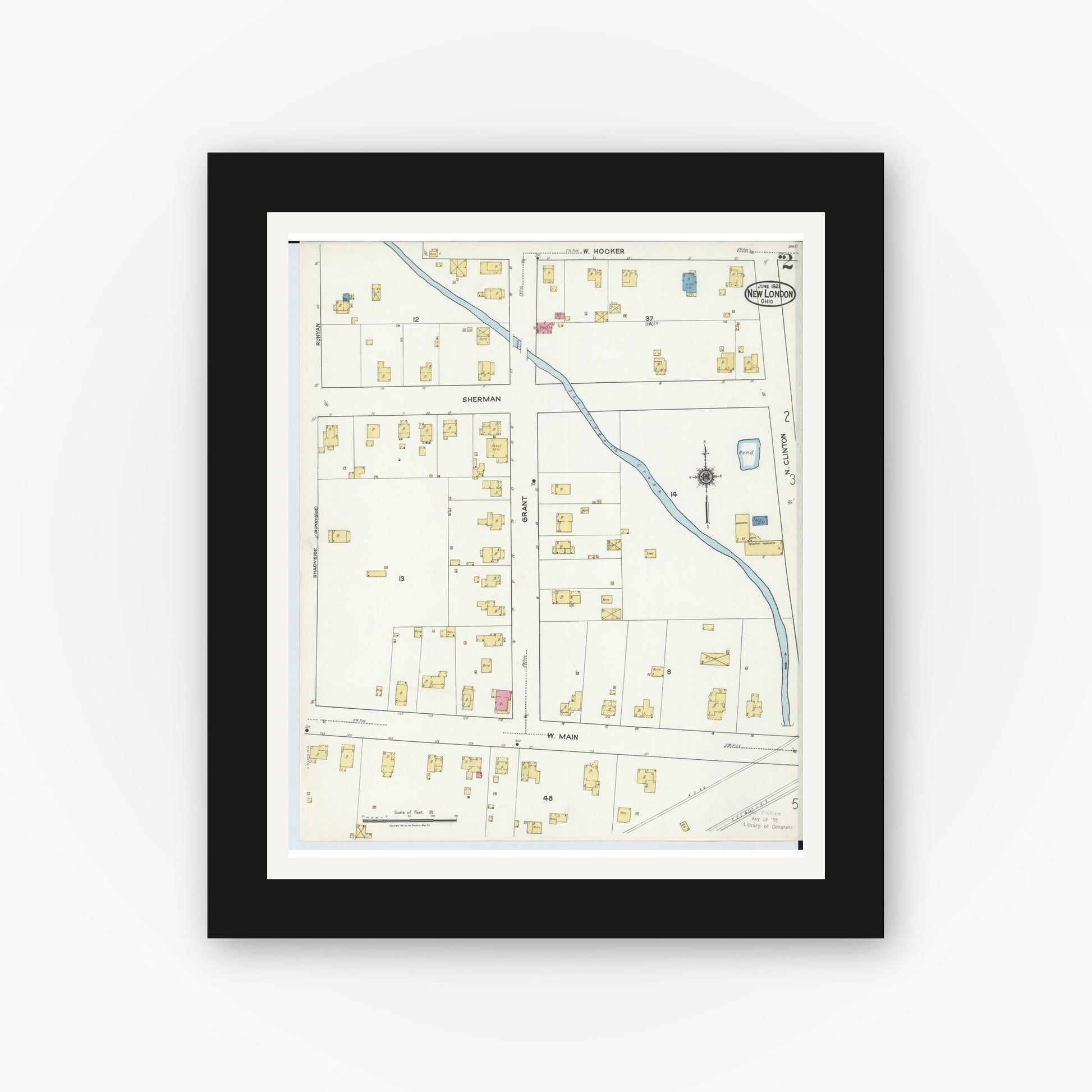 Old map wall art mockup — black gallery frame with white mat — Sanborn Fire Insurance Map from New London, Huron County, Ohio (1921), Sheet #0002