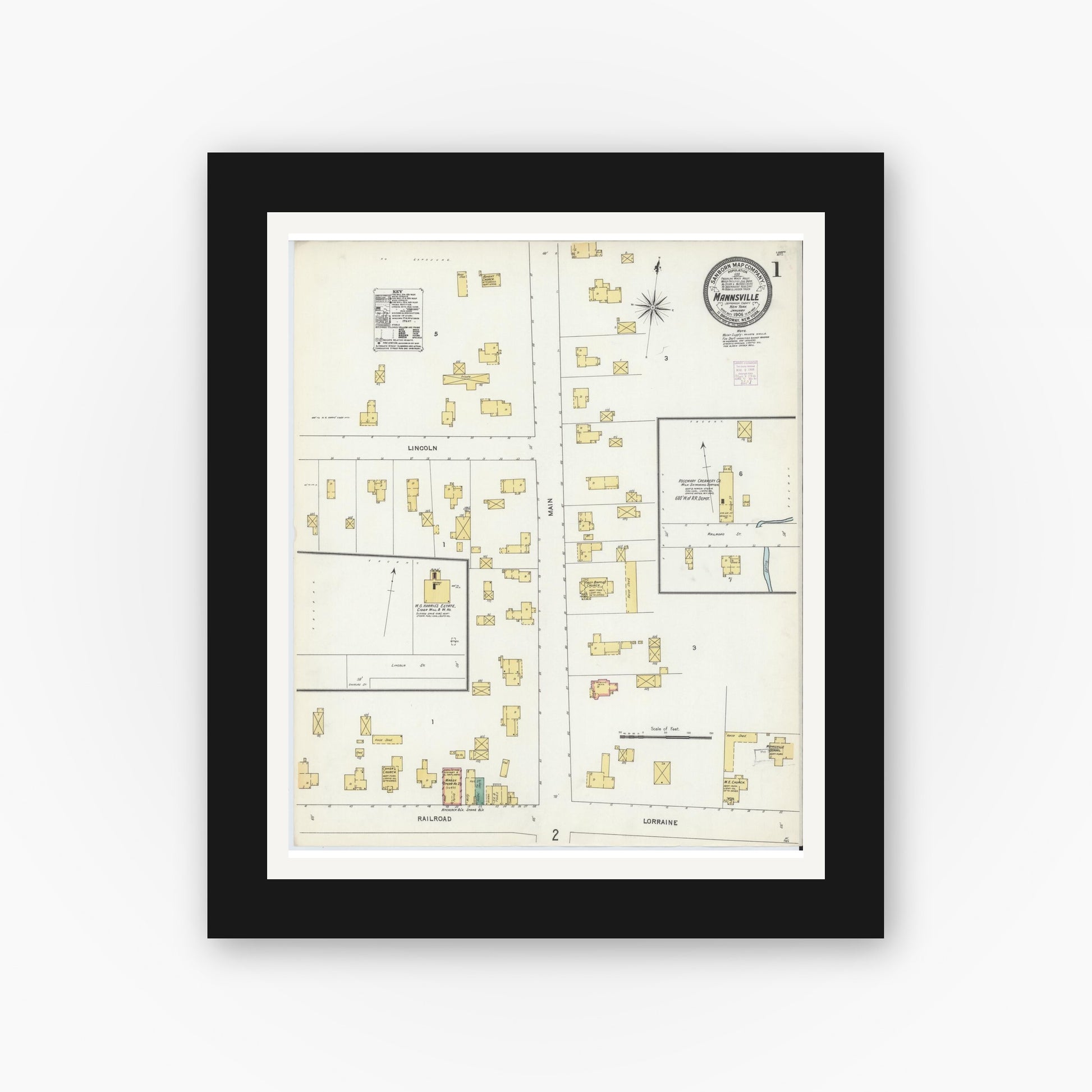 Old map wall art mockup — black gallery frame with white mat — Sanborn Fire Insurance Map from Mannsville, Jefferson County, New York (1906), Sheet #0001