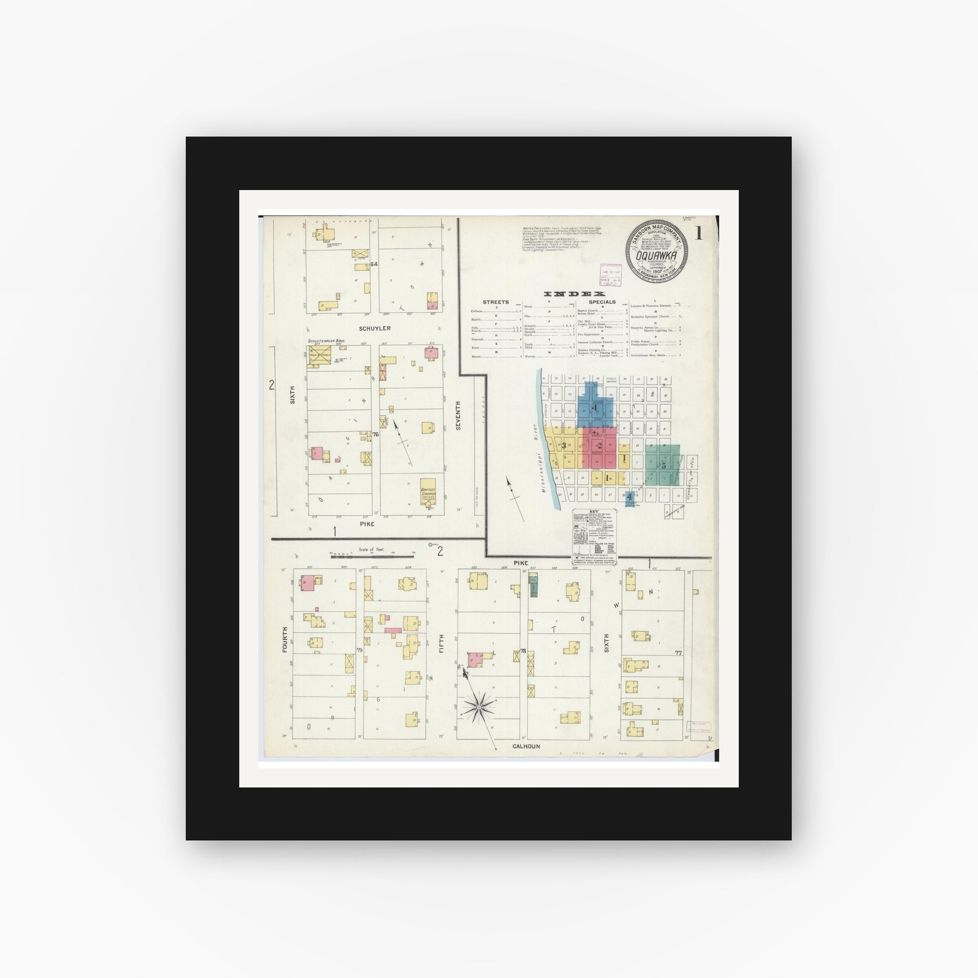 Old map wall art mockup — black gallery frame with white mat — Sanborn Fire Insurance Map from Oquawka, Henderson County, Illinois (1907), Sheet #0001