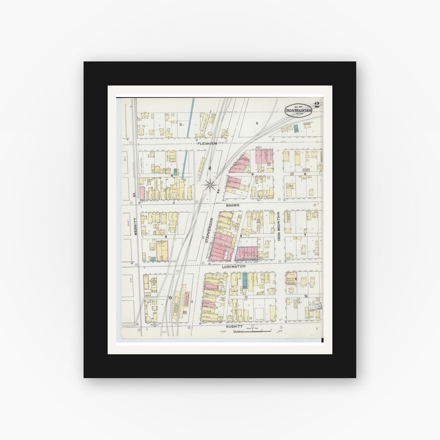 Old map wall art mockup — black gallery frame with white mat — Sanborn Fire Insurance Map from Iron Mountain, Dickinson County, Michigan (1891), Sheet #0002