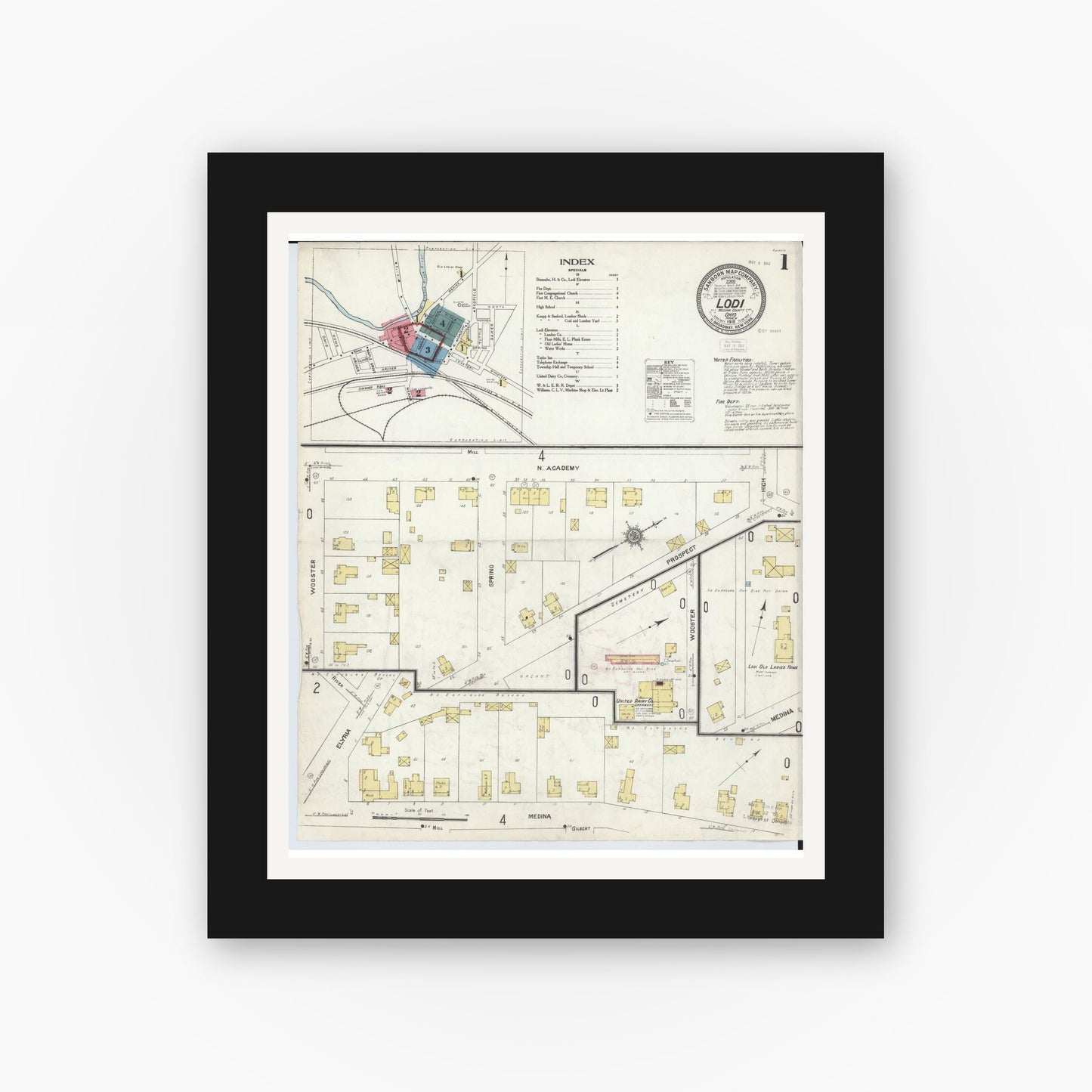 Old map wall art mockup — black gallery frame with white mat — Sanborn Fire Insurance Map from Lodi, Medina County, Ohio (1912), Sheet #0001