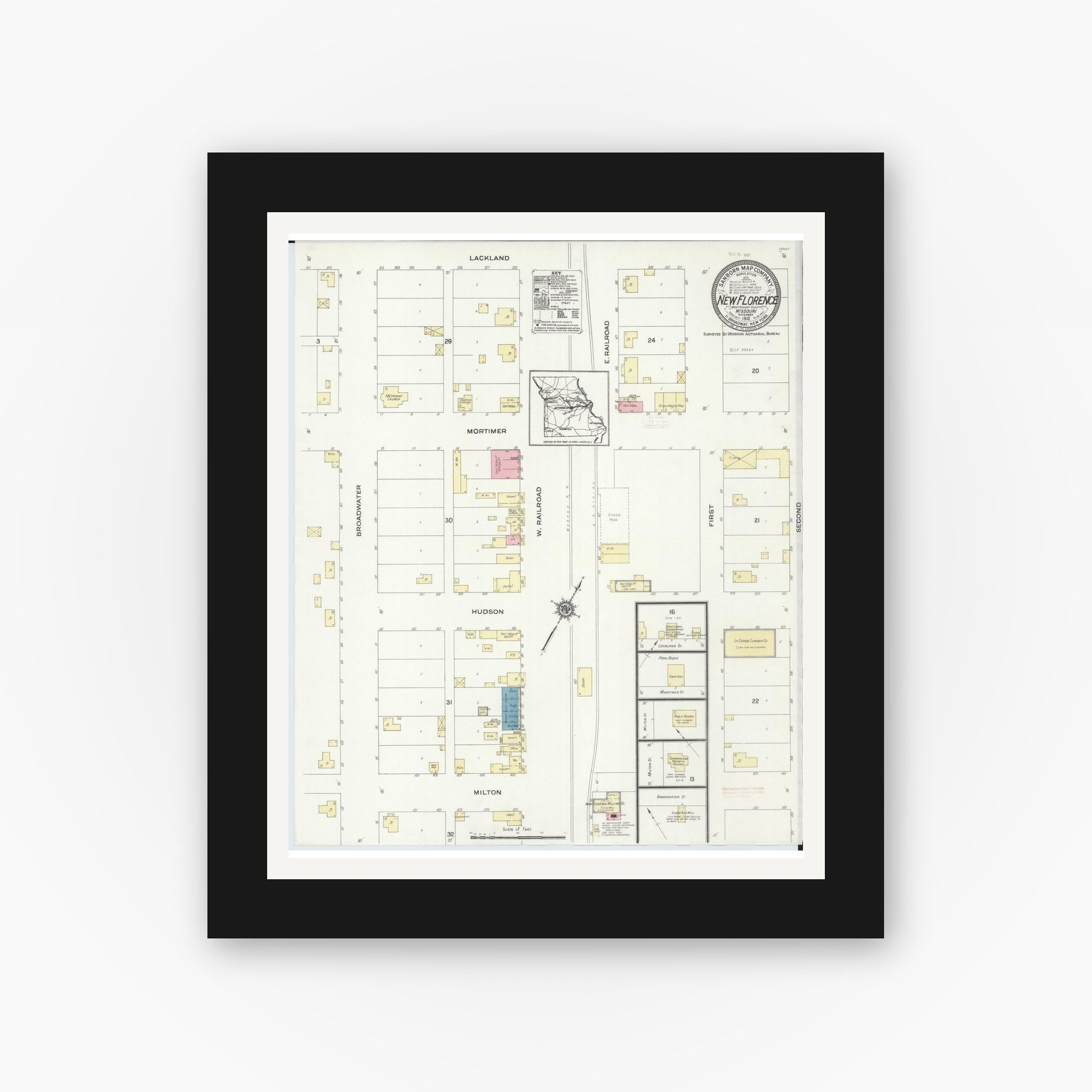 Old map wall art mockup — black gallery frame with white mat — Sanborn Fire Insurance Map from New Florence, Montgomery County, Missouri (1912), Sheet #0001