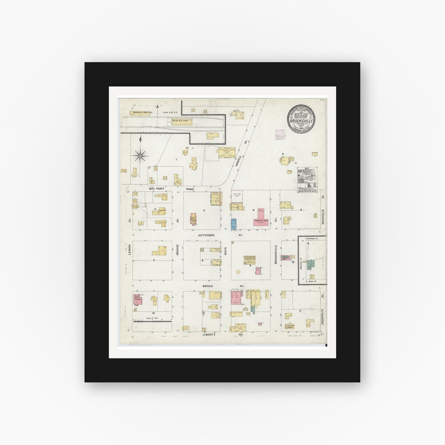 Old map wall art mockup — black gallery frame with white mat — Sanborn Fire Insurance Map from Brooksville, Hernando County, Florida (1906), Sheet #0001
