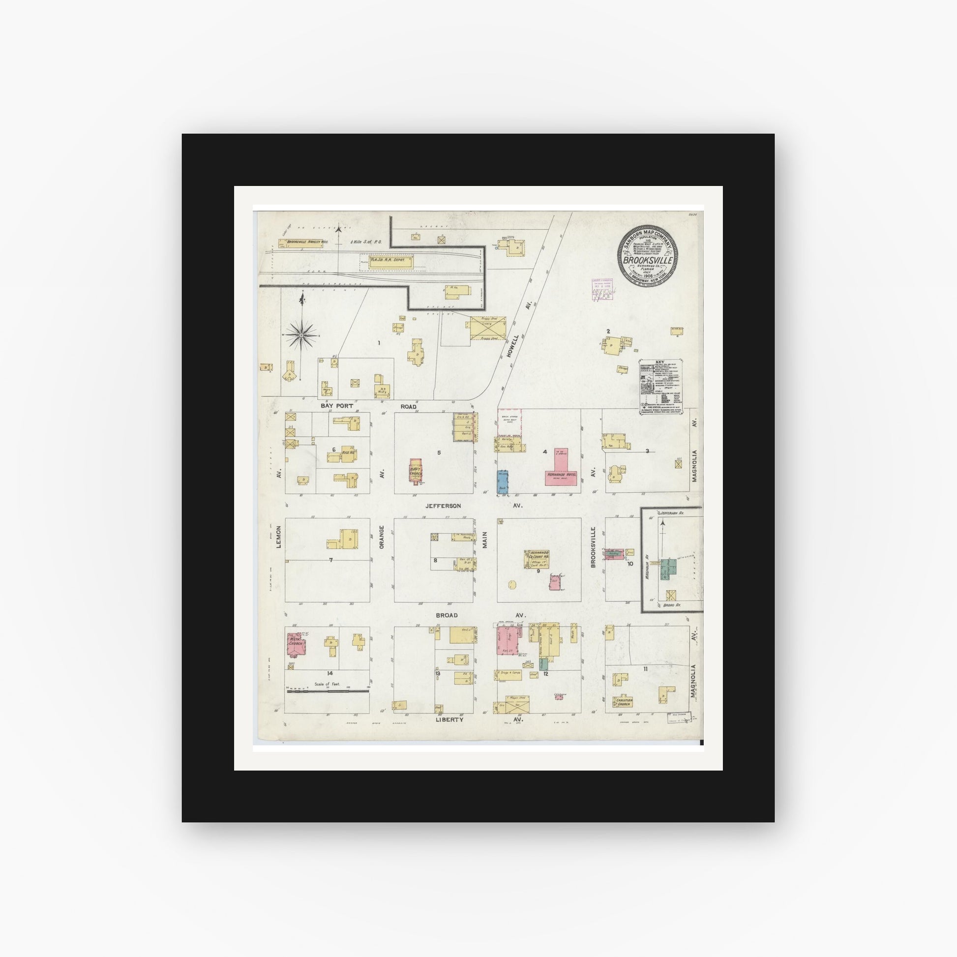 Old map wall art mockup — black gallery frame with white mat — Sanborn Fire Insurance Map from Brooksville, Hernando County, Florida (1906), Sheet #0001