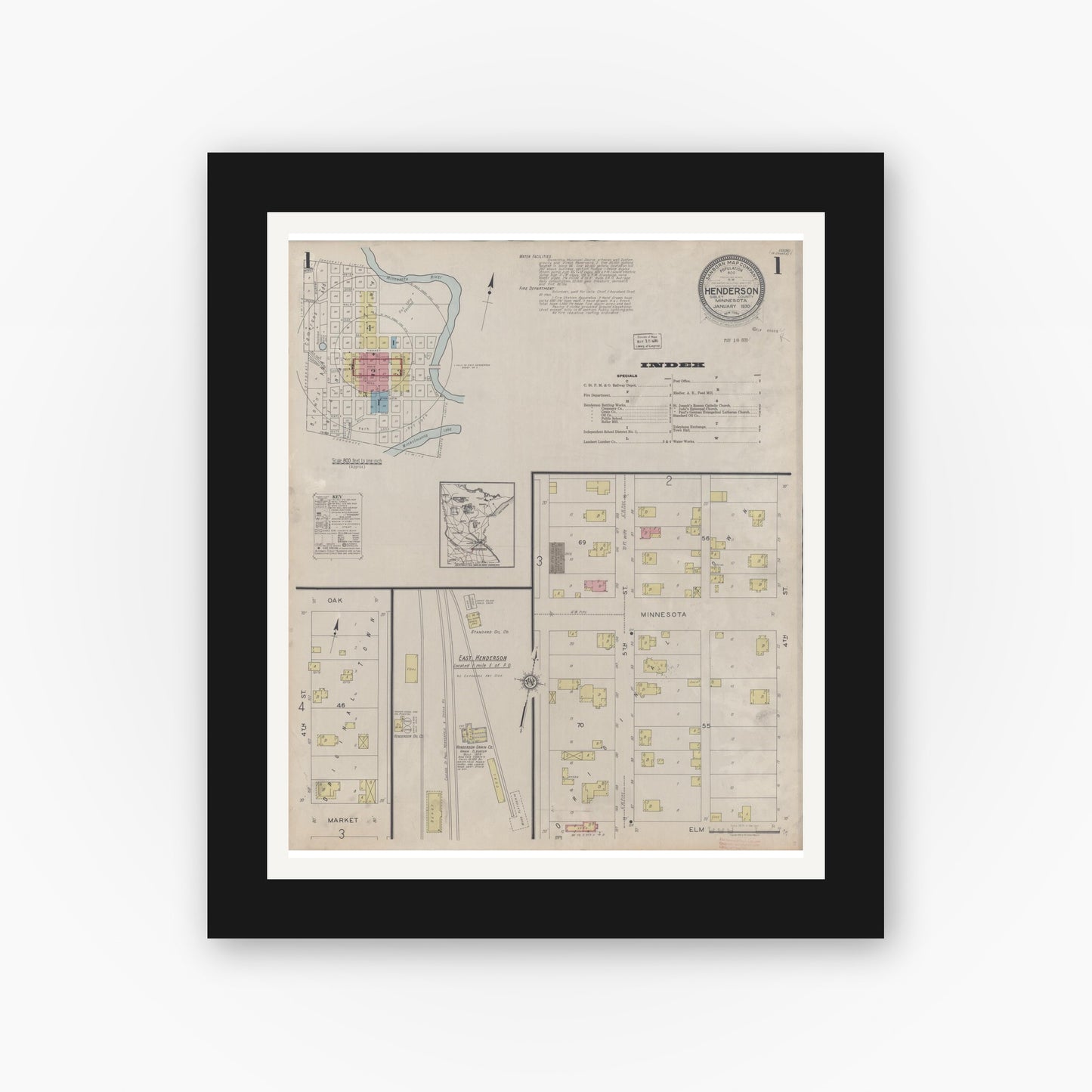 Old map wall art mockup — black gallery frame with white mat — Sanborn Fire Insurance Map from Henderson, Sibley County, Minnesota (1930), Sheet #0001