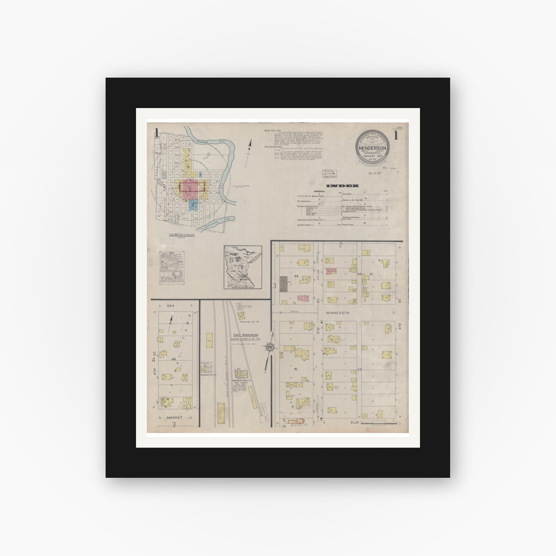 Old map wall art mockup — black gallery frame with white mat — Sanborn Fire Insurance Map from Henderson, Sibley County, Minnesota (1930), Sheet #0001