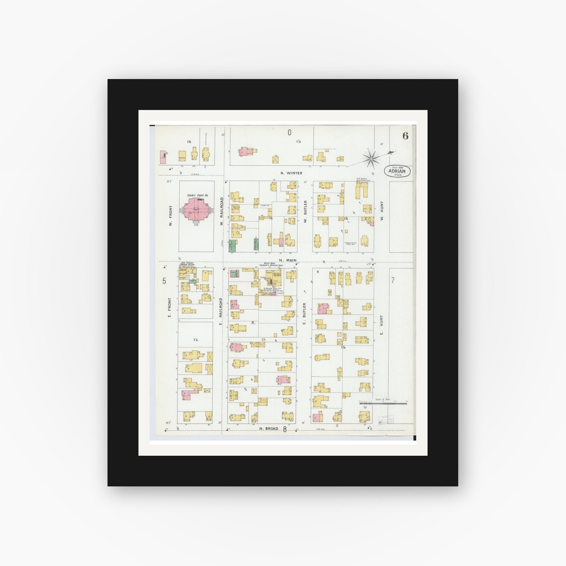 Old map wall art mockup — black gallery frame with white mat — Sanborn Fire Insurance Map from Adrian, Lenawee County, Michigan (1899), Sheet #0006