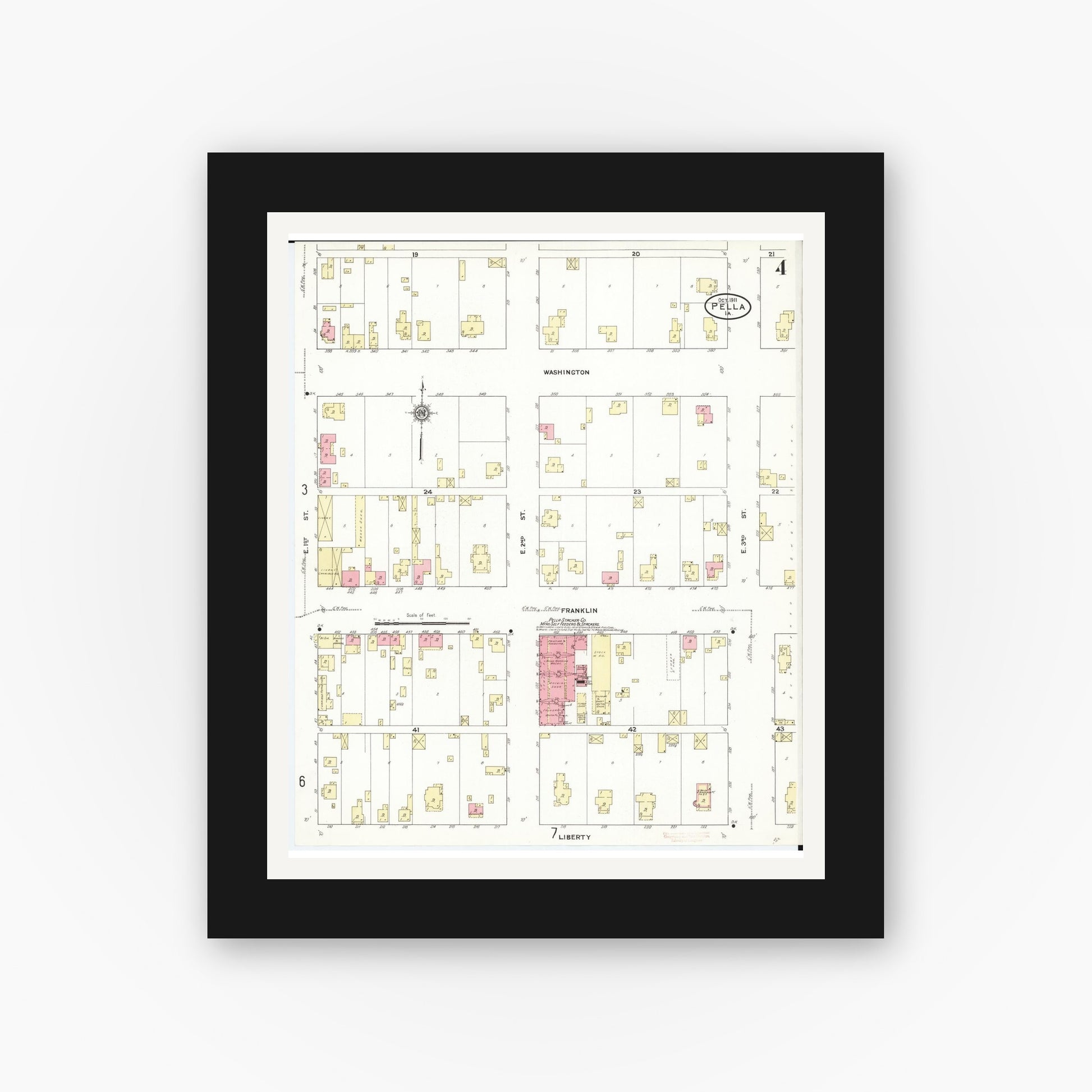 Old map wall art mockup — black gallery frame with white mat — Sanborn Fire Insurance Map from Pella, Marion County, Iowa (1911), Sheet #0004