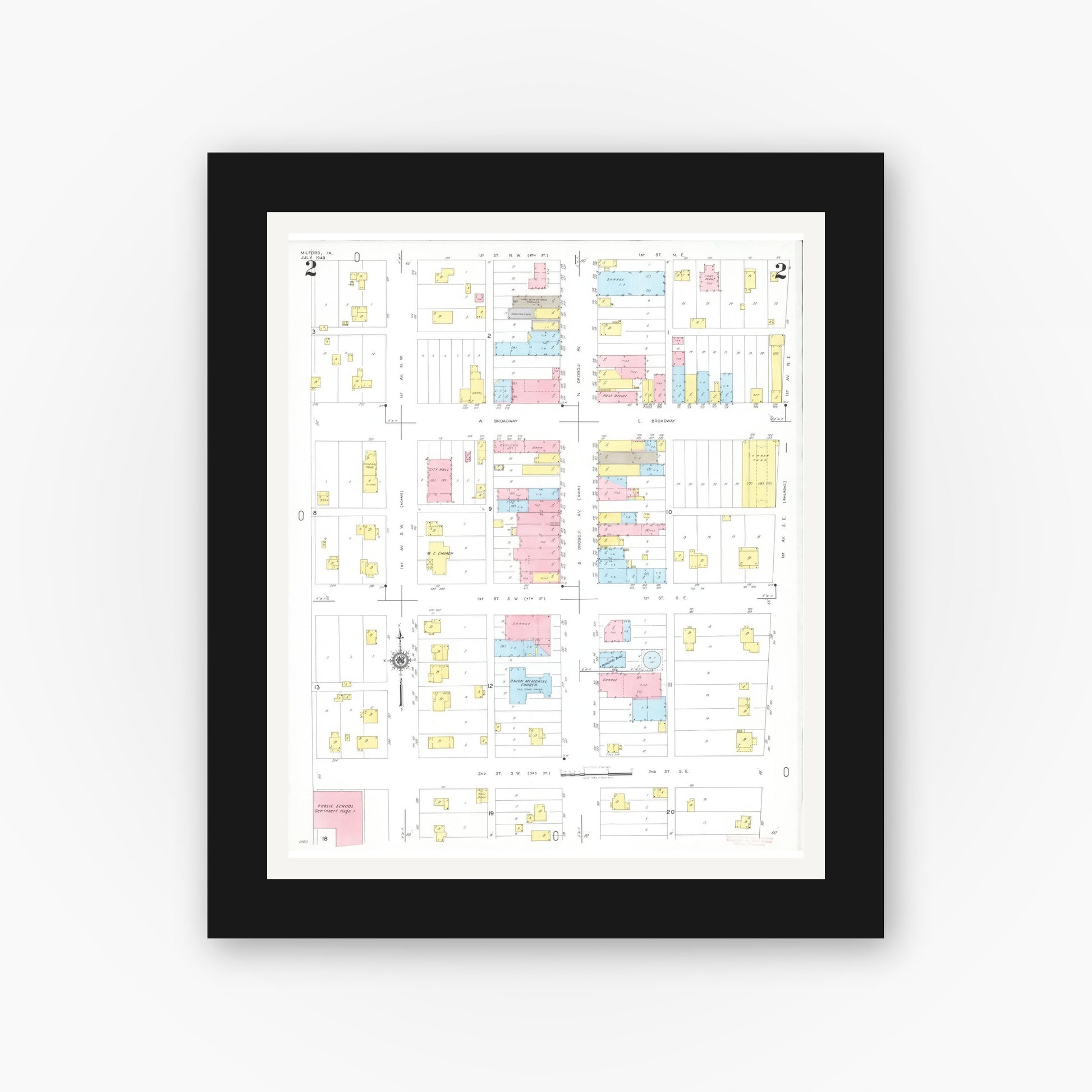 Old map wall art mockup — black gallery frame with white mat — Sanborn Fire Insurance Map from Milford, Dickinson County, Iowa (1949), Sheet #0002