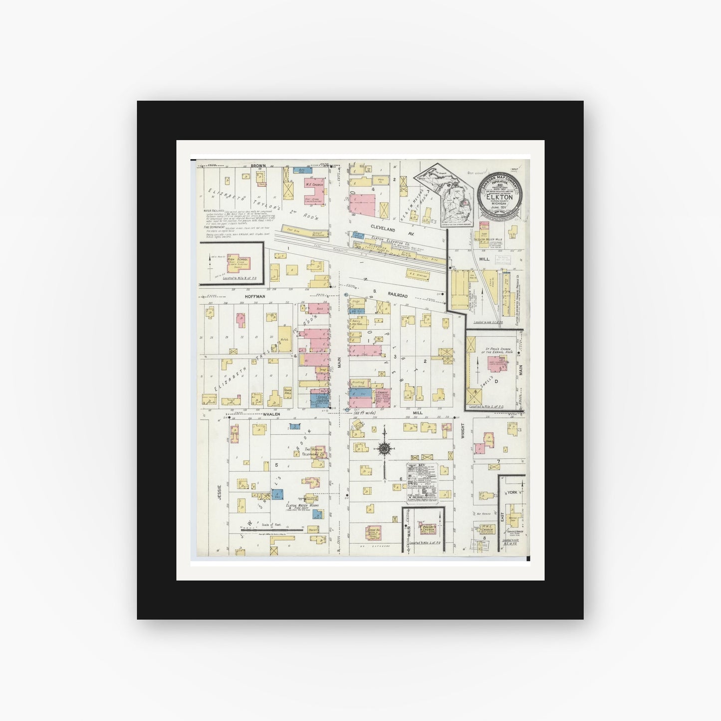 Old map wall art mockup — black gallery frame with white mat — Sanborn Fire Insurance Map from Elkton, Huron County, Michigan (1924), Sheet #0001