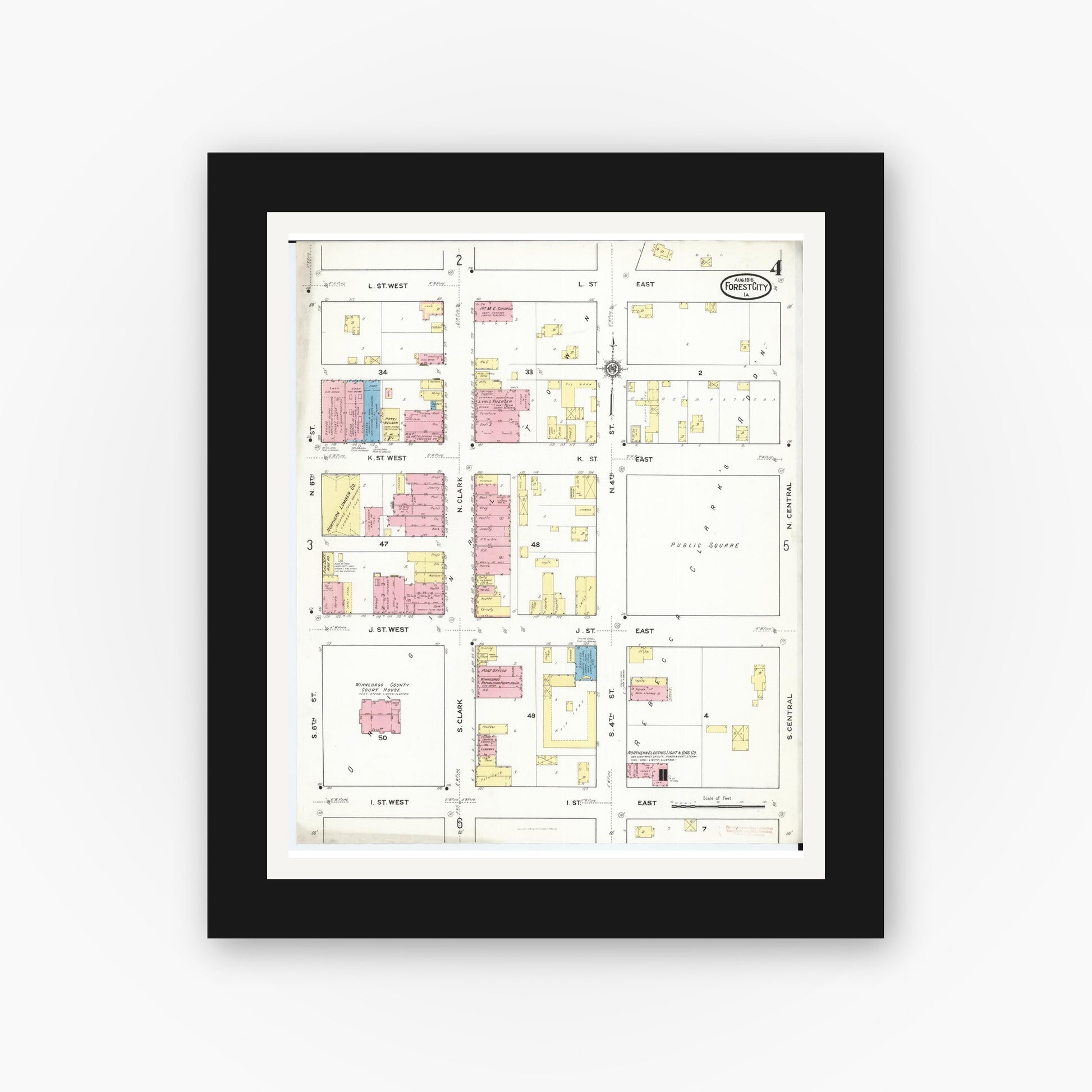Old map wall art mockup — black gallery frame with white mat — Sanborn Fire Insurance Map from Forest City, Winnebago County, Iowa (1916), Sheet #0004