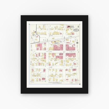 Old map wall art mockup — black gallery frame with white mat — Sanborn Fire Insurance Map from Versailles, Darke County, Ohio (1911), Sheet #0002