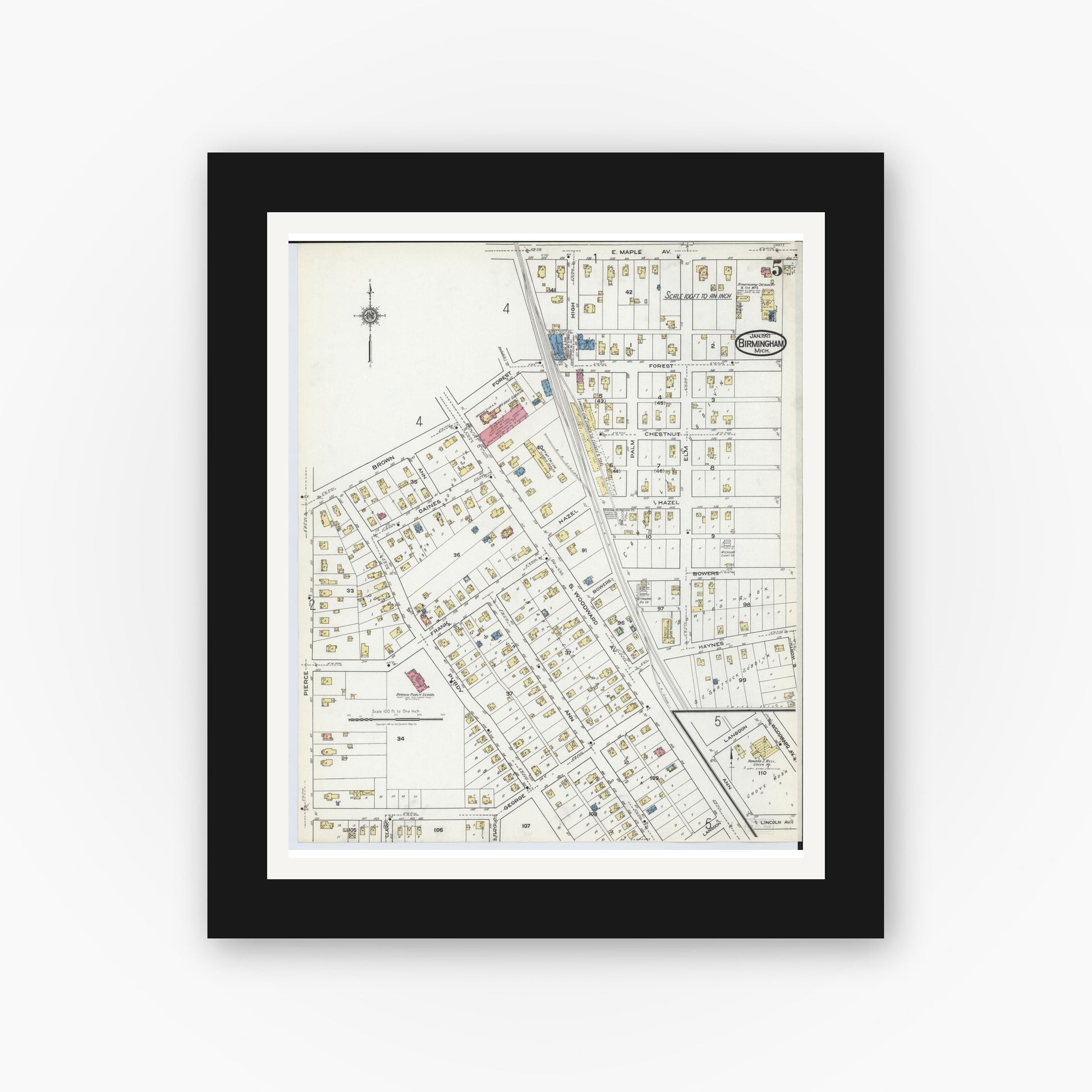 Old map wall art mockup — black gallery frame with white mat — Sanborn Fire Insurance Map from Birmingham, Oakland County, Michigan (1921), Sheet #0005