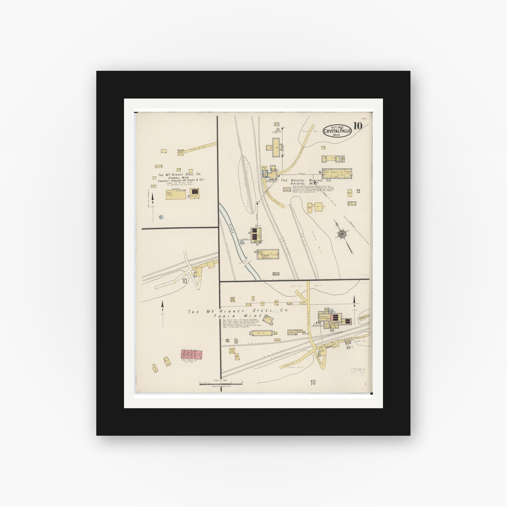 Old map wall art mockup — black gallery frame with white mat — Sanborn Fire Insurance Map from Crystal Falls, Iron County, Michigan (1922), Sheet #0010