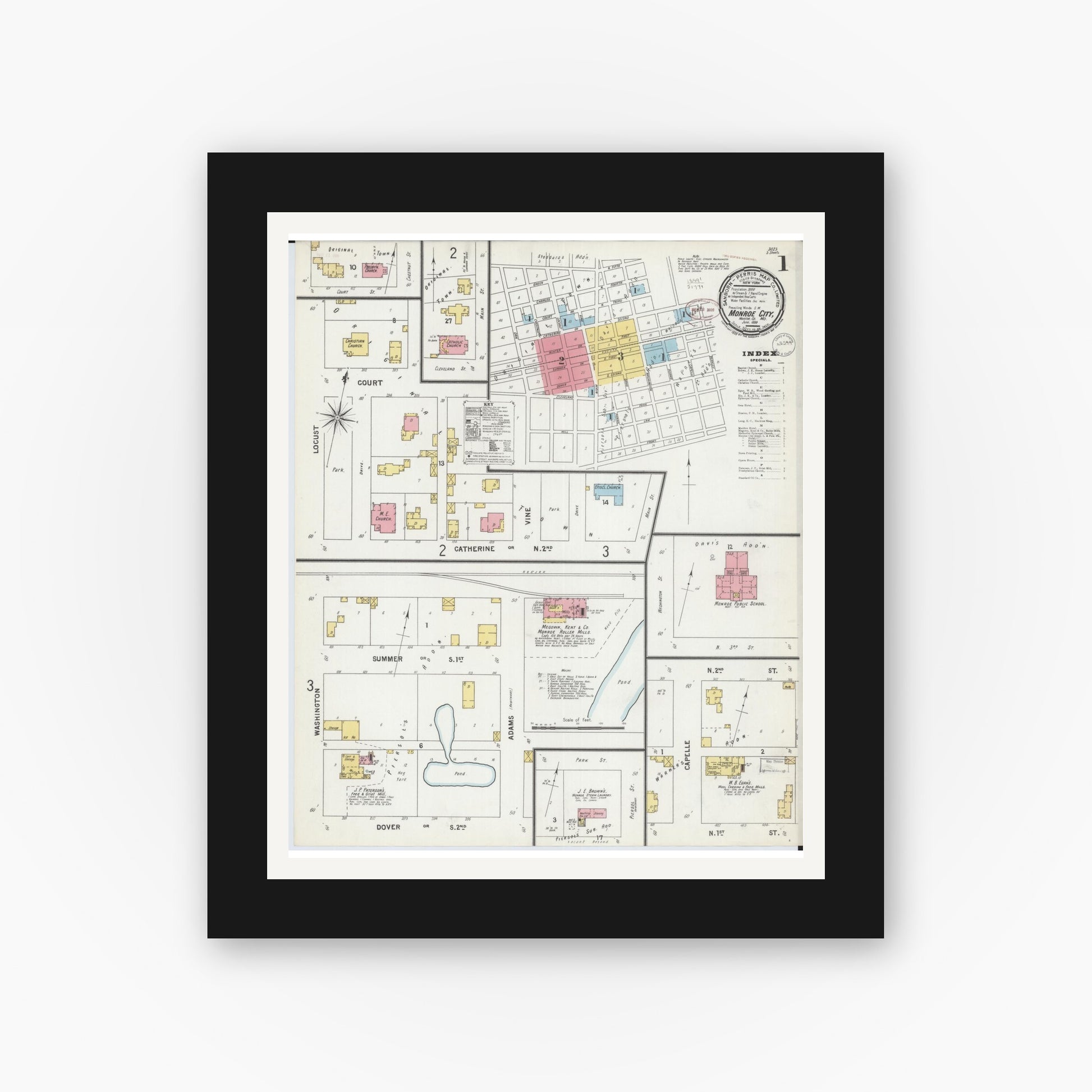 Old map wall art mockup — black gallery frame with white mat — Sanborn Fire Insurance Map from Monroe City, Monroe County, Missouri (1899), Sheet #0001