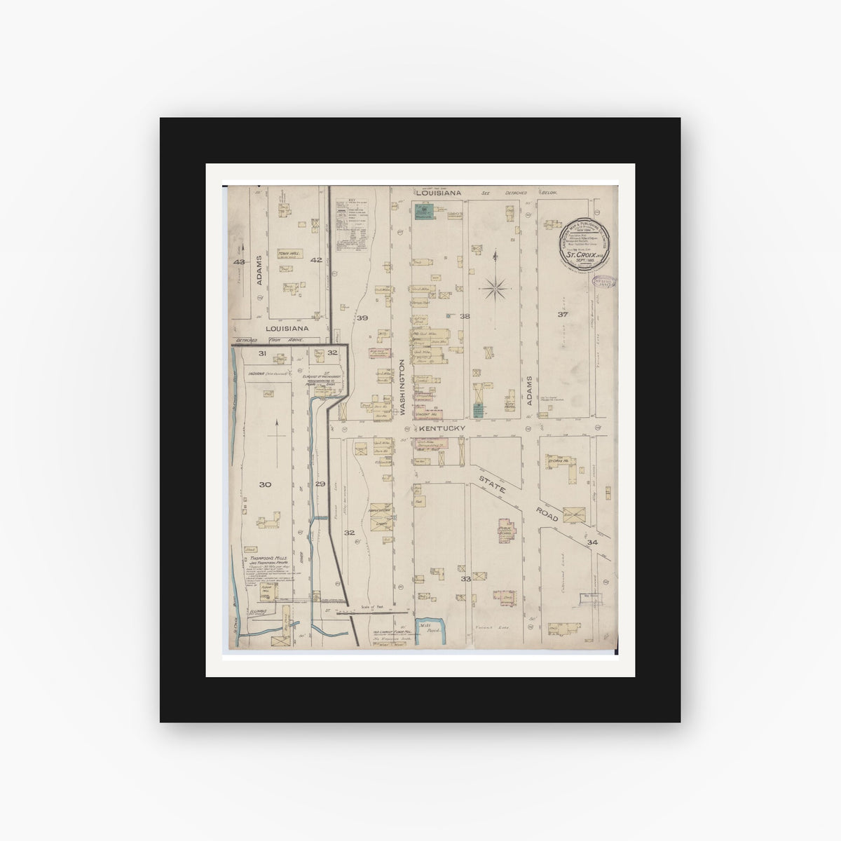 Old map wall art mockup — black gallery frame with white mat — Sanborn Fire Insurance Map from Saint Croix Falls, Polk County, Wisconsin (1885), Sheet #0001