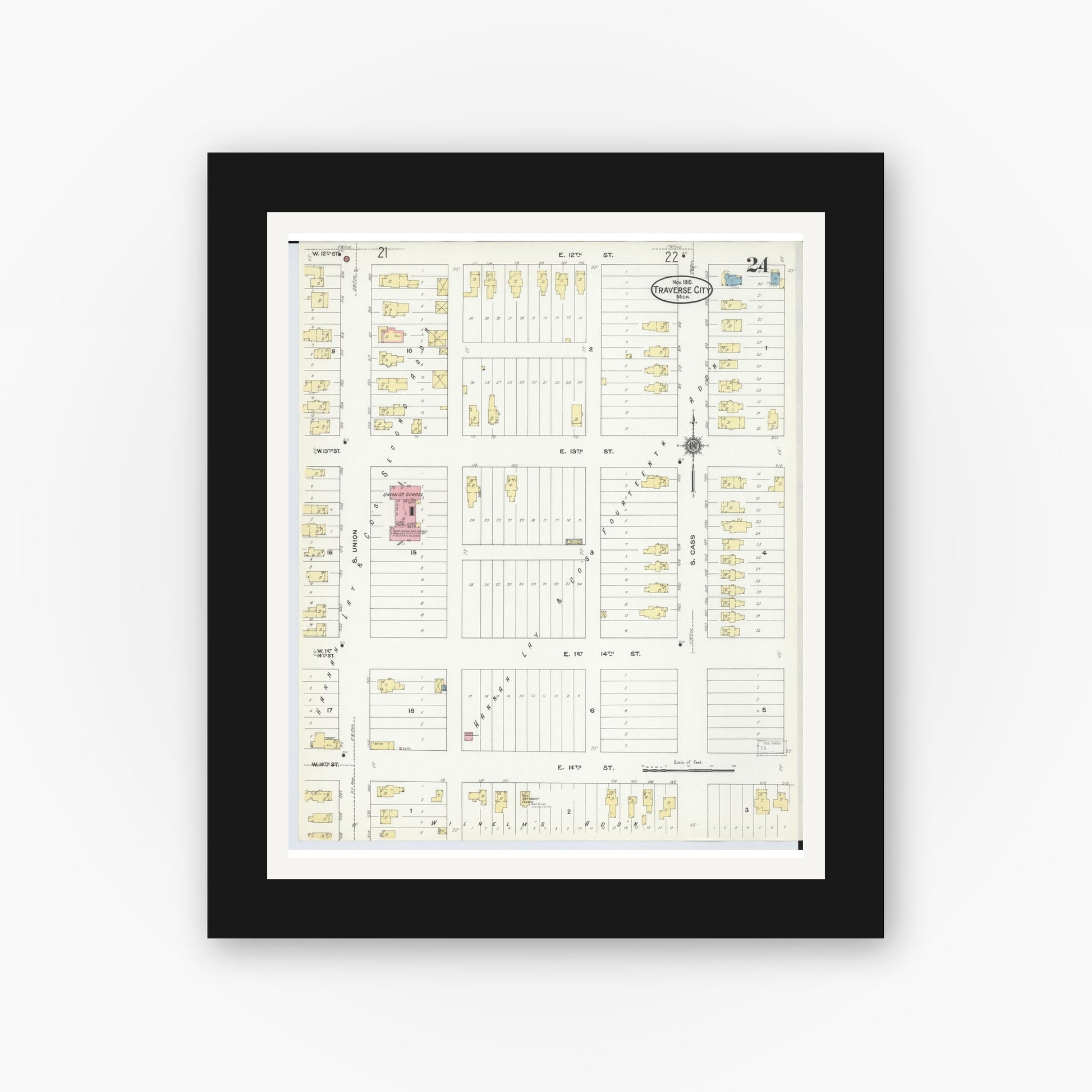Old map wall art mockup — black gallery frame with white mat — Sanborn Fire Insurance Map from Traverse City, Grand Traverse County, Michigan (1910), Sheet #0024