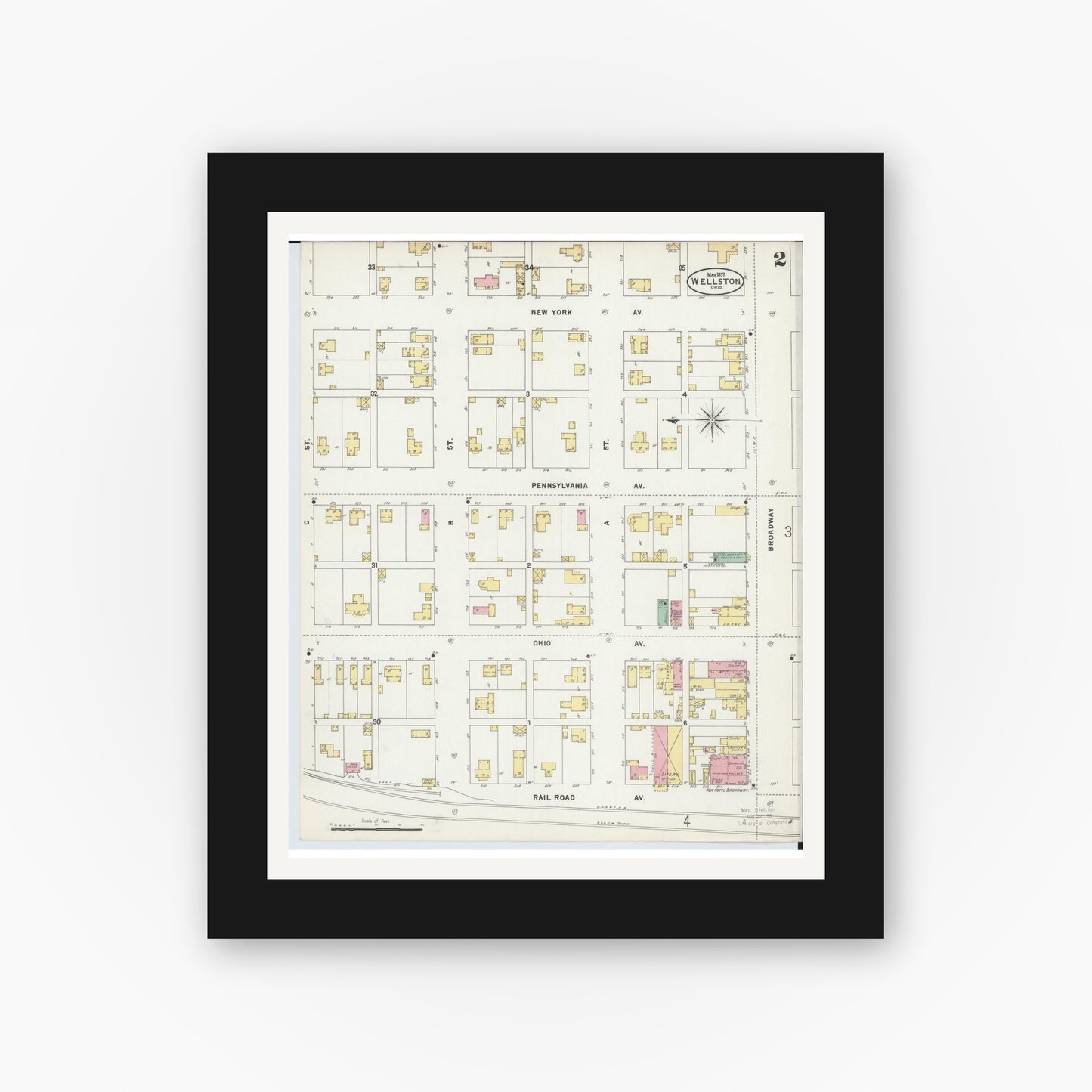 Old map wall art mockup — black gallery frame with white mat — Sanborn Fire Insurance Map from Wellston, Jackson County, Ohio (1897), Sheet #0002
