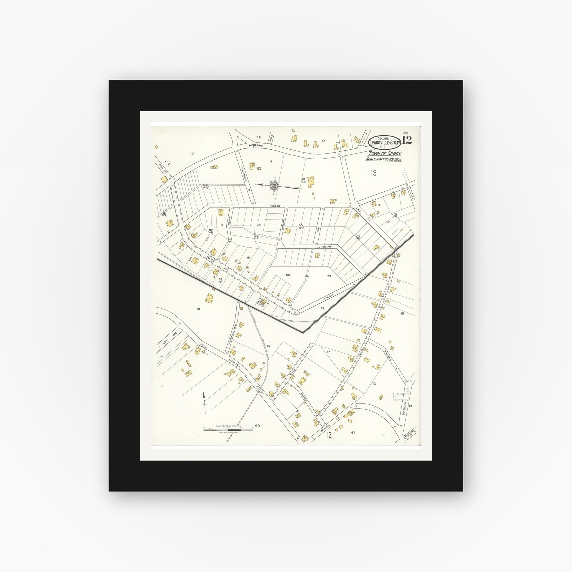 Old map wall art mockup — black gallery frame with white mat — Sanborn Fire Insurance Map from Leaksville-spray, Rockingham County, North Carolina (1921), Sheet #0012