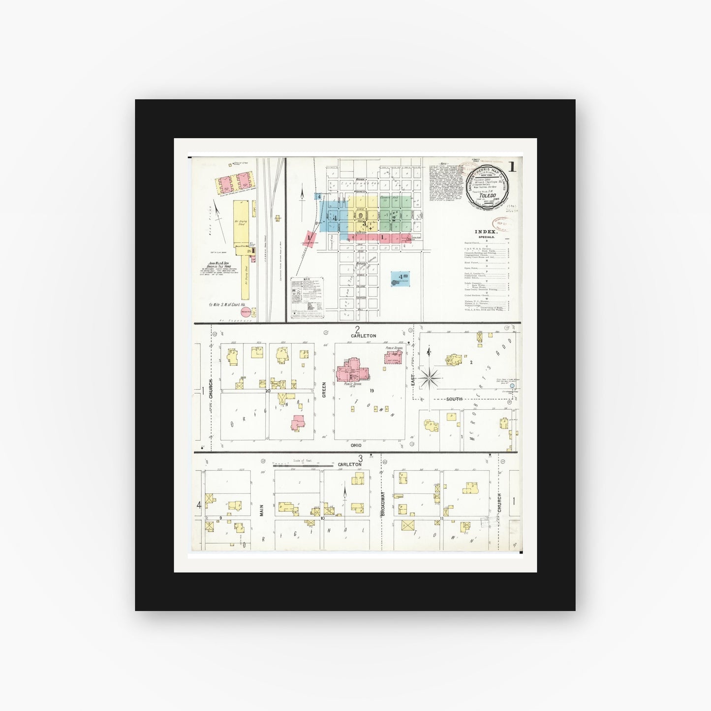 Old map wall art mockup — black gallery frame with white mat — Sanborn Fire Insurance Map from Toledo, Tama County, Iowa (1899) â€” Complete Set