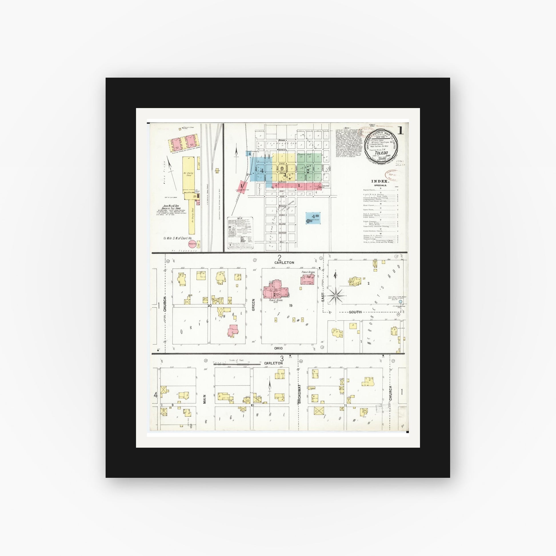 Old map wall art mockup — black gallery frame with white mat — Sanborn Fire Insurance Map from Toledo, Tama County, Iowa (1899) â€” Complete Set