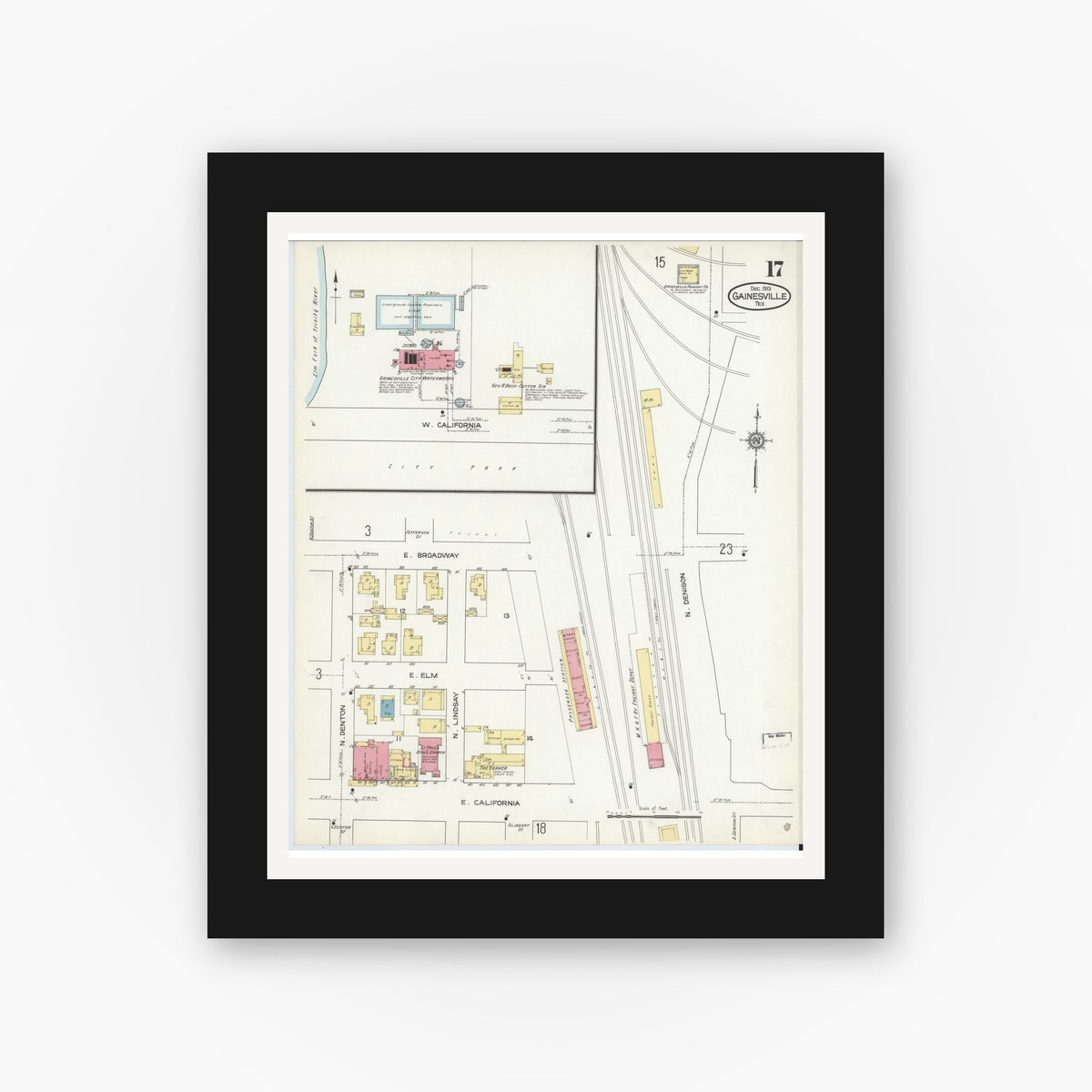 Old map wall art mockup — black gallery frame with white mat — Sanborn Fire Insurance Map from Gainesville, Cooke County, Texas (1913), Sheet #0017