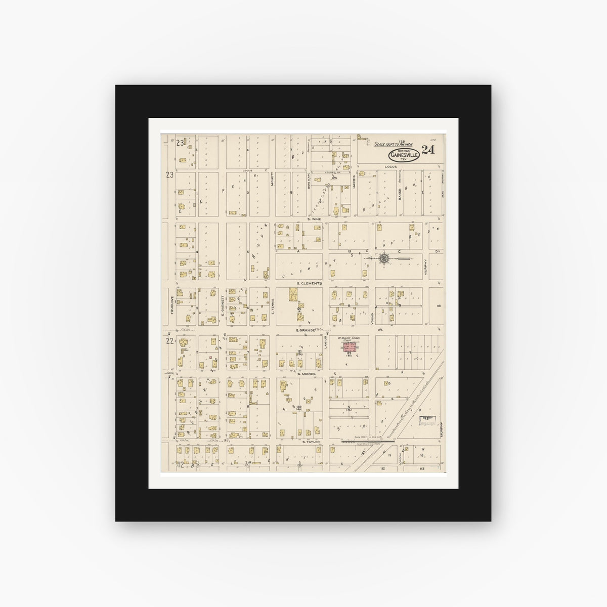 Old map wall art mockup — black gallery frame with white mat — Sanborn Fire Insurance Map from Gainesville, Cooke County, Texas (1922), Sheet #0024