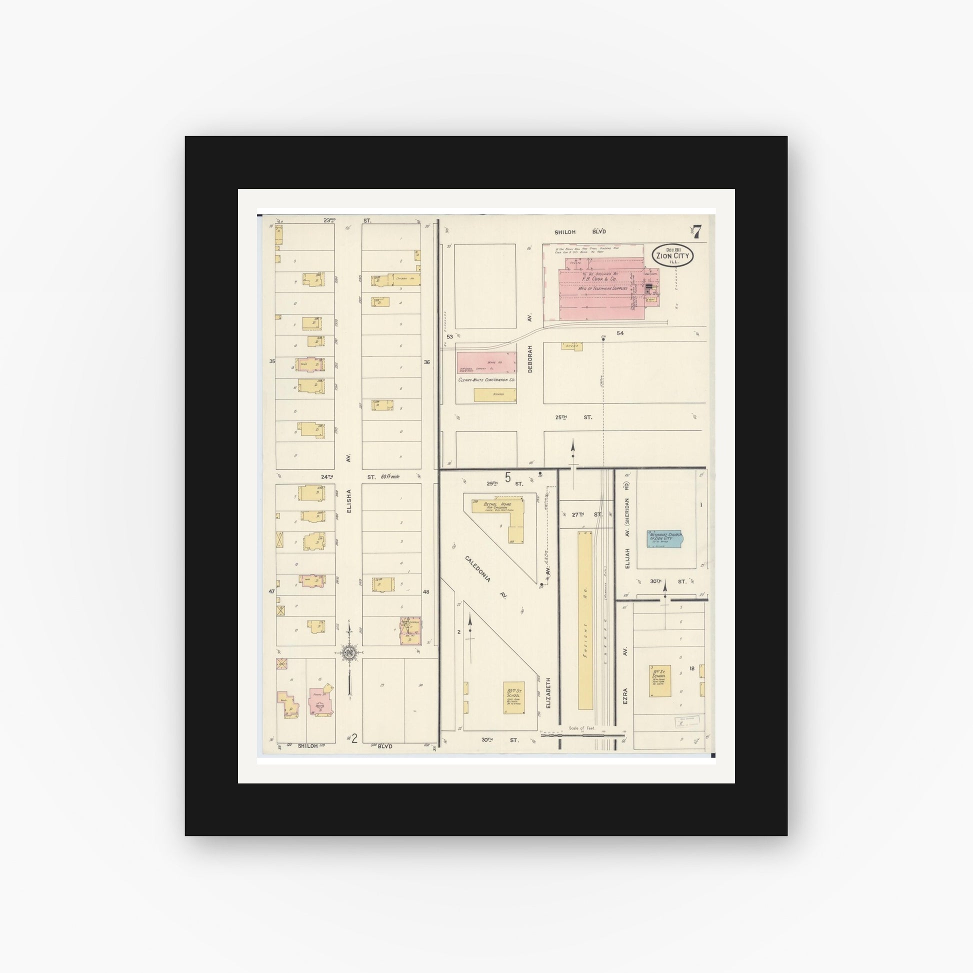 Old map wall art mockup — black gallery frame with white mat — Sanborn Fire Insurance Map from Zion, Lake County, Illinois (1911), Sheet #0007