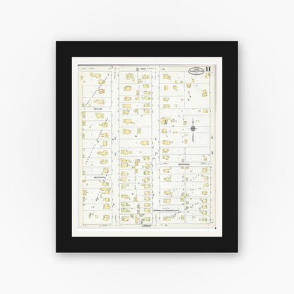 Old map wall art mockup — black gallery frame with white mat — Sanborn Fire Insurance Map from Charleston, Coles County, Illinois (1910), Sheet #0011