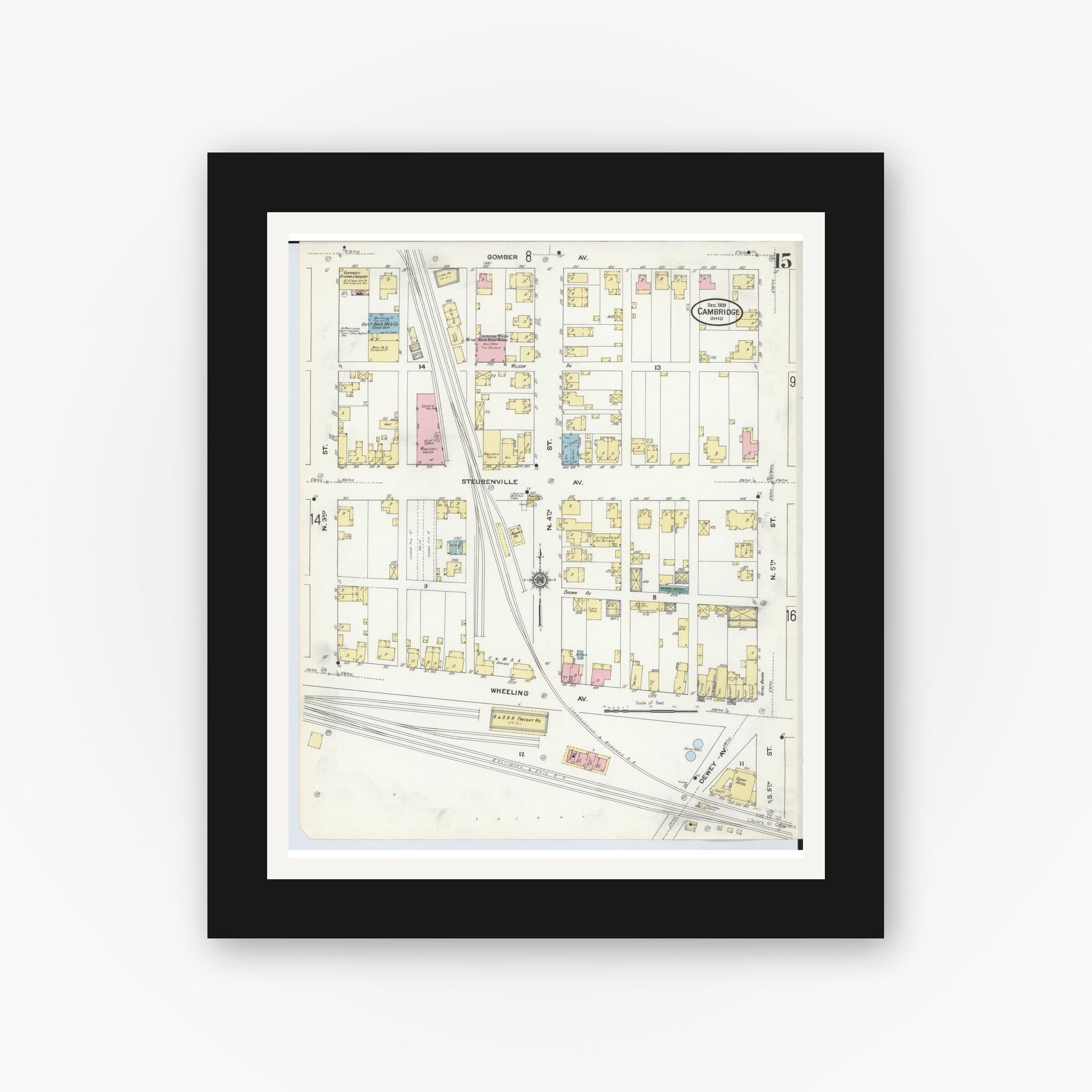 Old map wall art mockup — black gallery frame with white mat — Sanborn Fire Insurance Map from Cambridge, Guernsey County, Ohio (1909), Sheet #0015