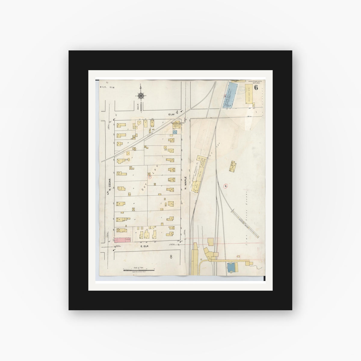 Old map wall art mockup — black gallery frame with white mat — Sanborn Fire Insurance Map from Manistique, Schoolcraft County, Michigan (1950), Sheet #0006