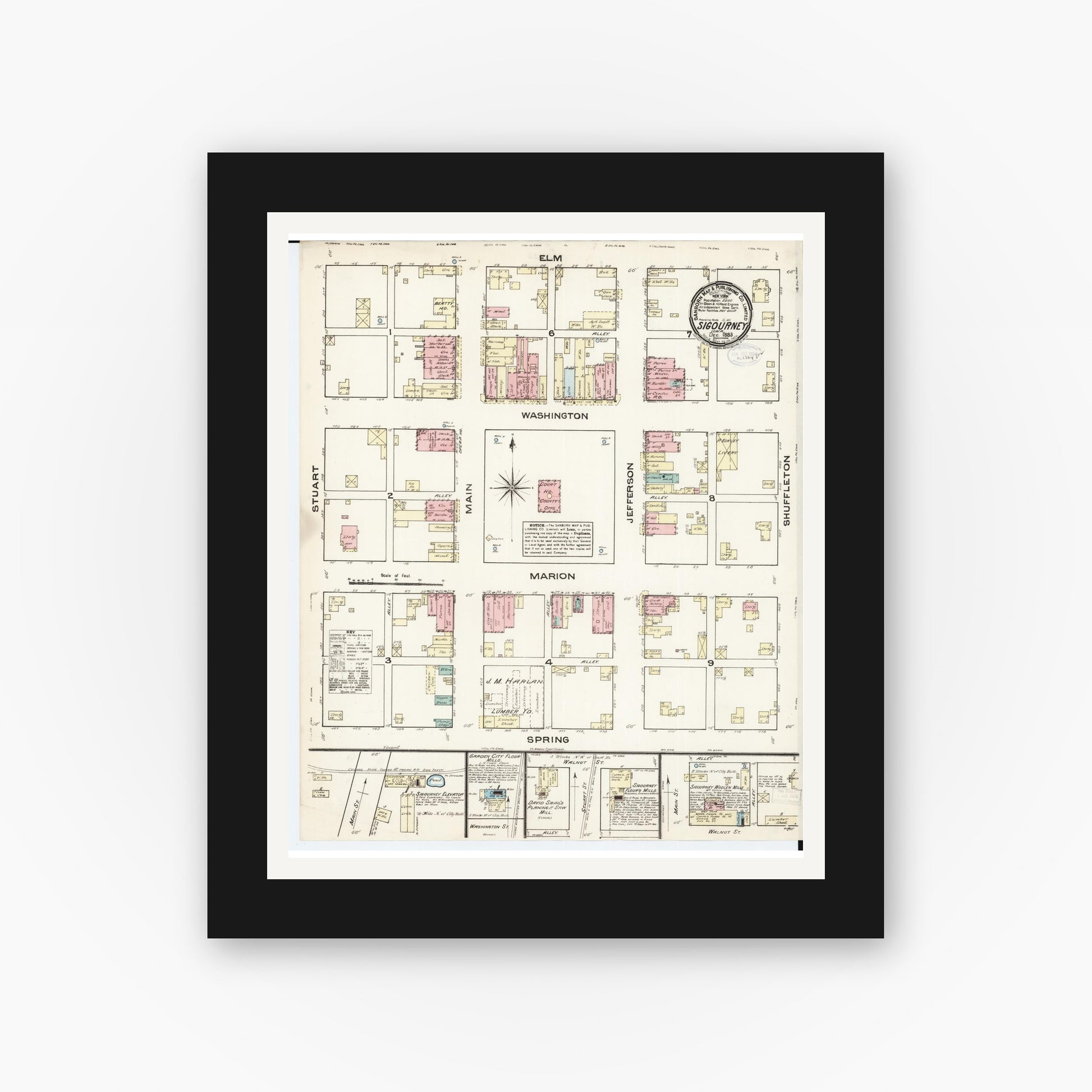 Old map wall art mockup — black gallery frame with white mat — Sanborn Fire Insurance Map from Sigourney, Kiokuk County, Iowa (1883), Sheet #0001