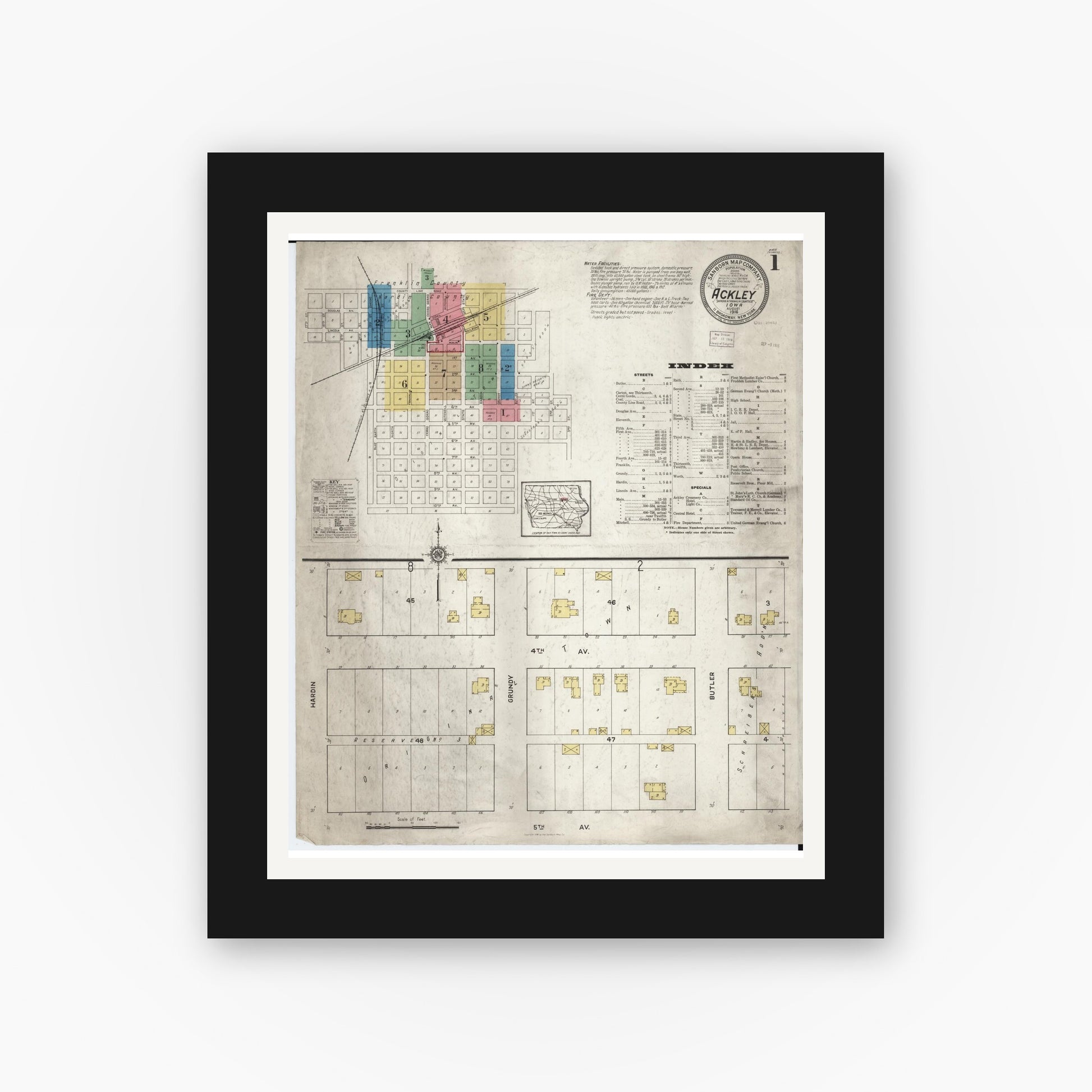 Old map wall art mockup — black gallery frame with white mat — Sanborn Fire Insurance Map from Ackley, Hardin and Franklin Counties, Iowa (1916) â€” Complete Set
