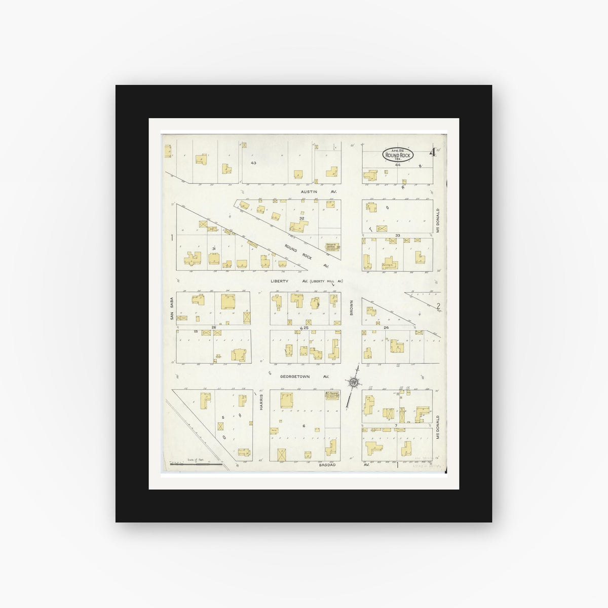 Old map wall art mockup — black gallery frame with white mat — Sanborn Fire Insurance Map from Round Rock, Williamson County, Texas (1916), Sheet #0004