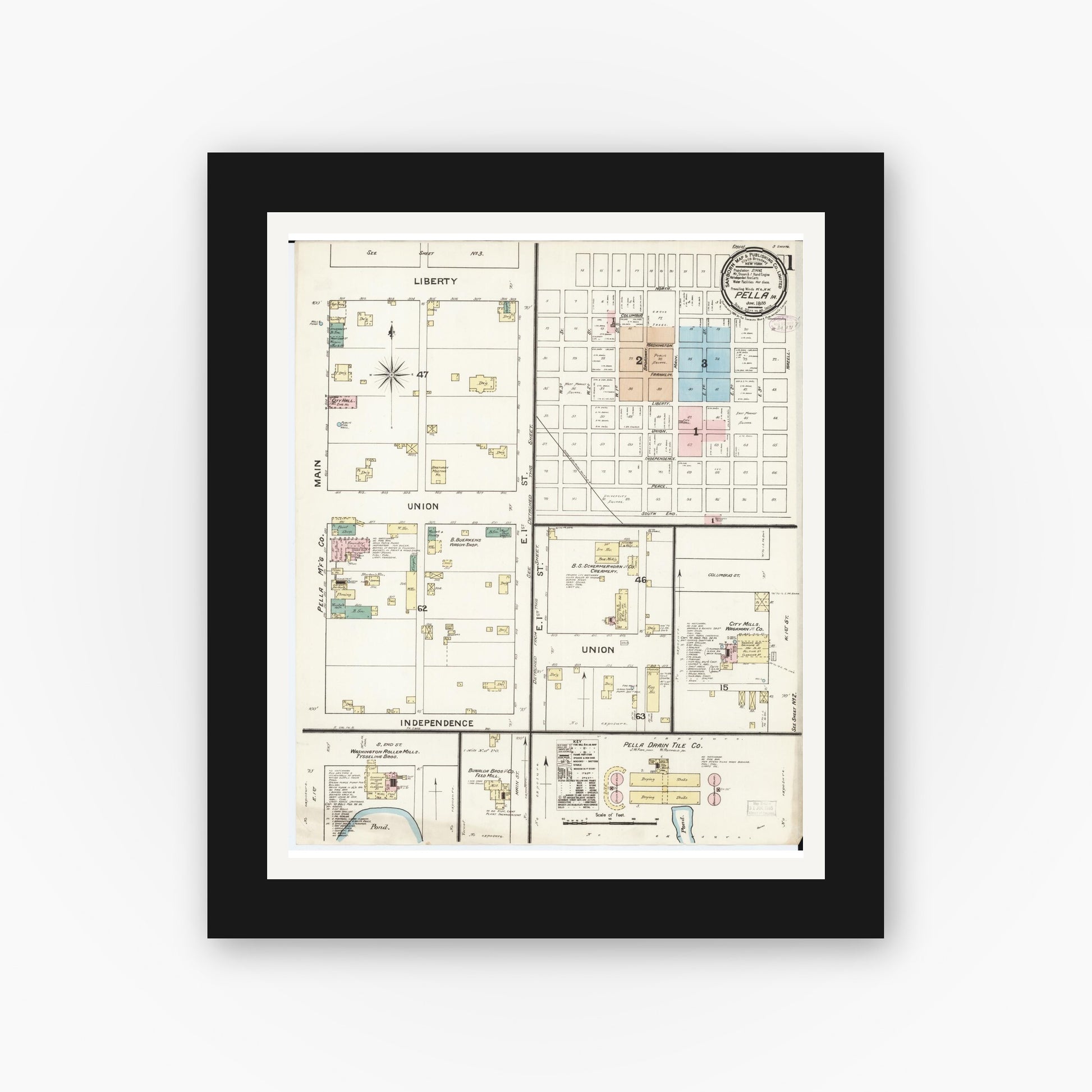 Old map wall art mockup — black gallery frame with white mat — Sanborn Fire Insurance Map from Pella, Marion County, Iowa (1888), Sheet #0001