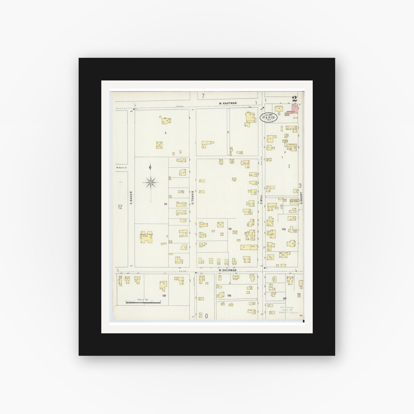 Old map wall art mockup — black gallery frame with white mat — Sanborn Fire Insurance Map from Paris, Lamar County, Texas (1897), Sheet #0002